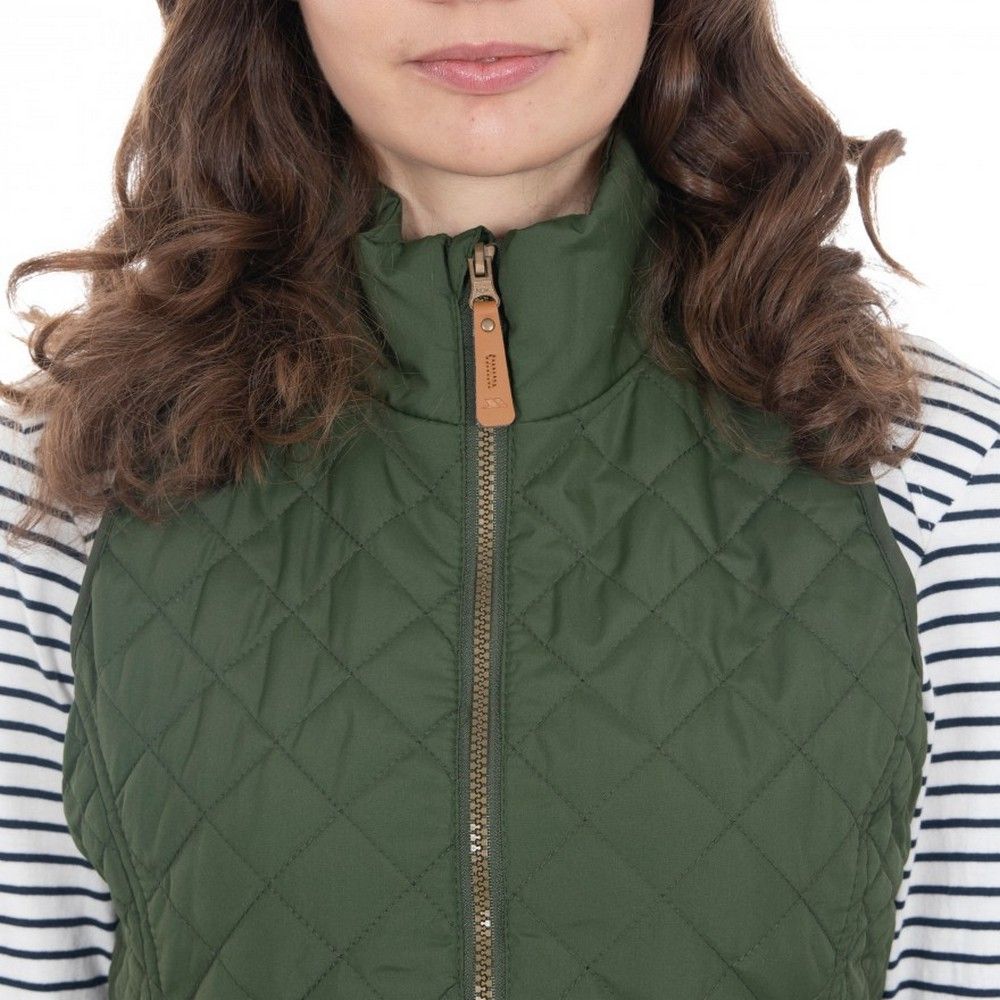 Lightly padded. Shaped quilting. 2 zip pockets. Adjustable drawcord waist with toggle. Matching binding at armhole. Back hem vent. Shell: 100% Polyester, Lining: 100% Polyester, Filling: 100% Polyester. Trespass Womens Chest Sizing (approx): XS/8 - 32in/81cm, S/10 - 34in/86cm, M/12 - 36in/91.4cm, L/14 - 38in/96.5cm, XL/16 - 40in/101.5cm, XXL/18 - 42in/106.5cm.