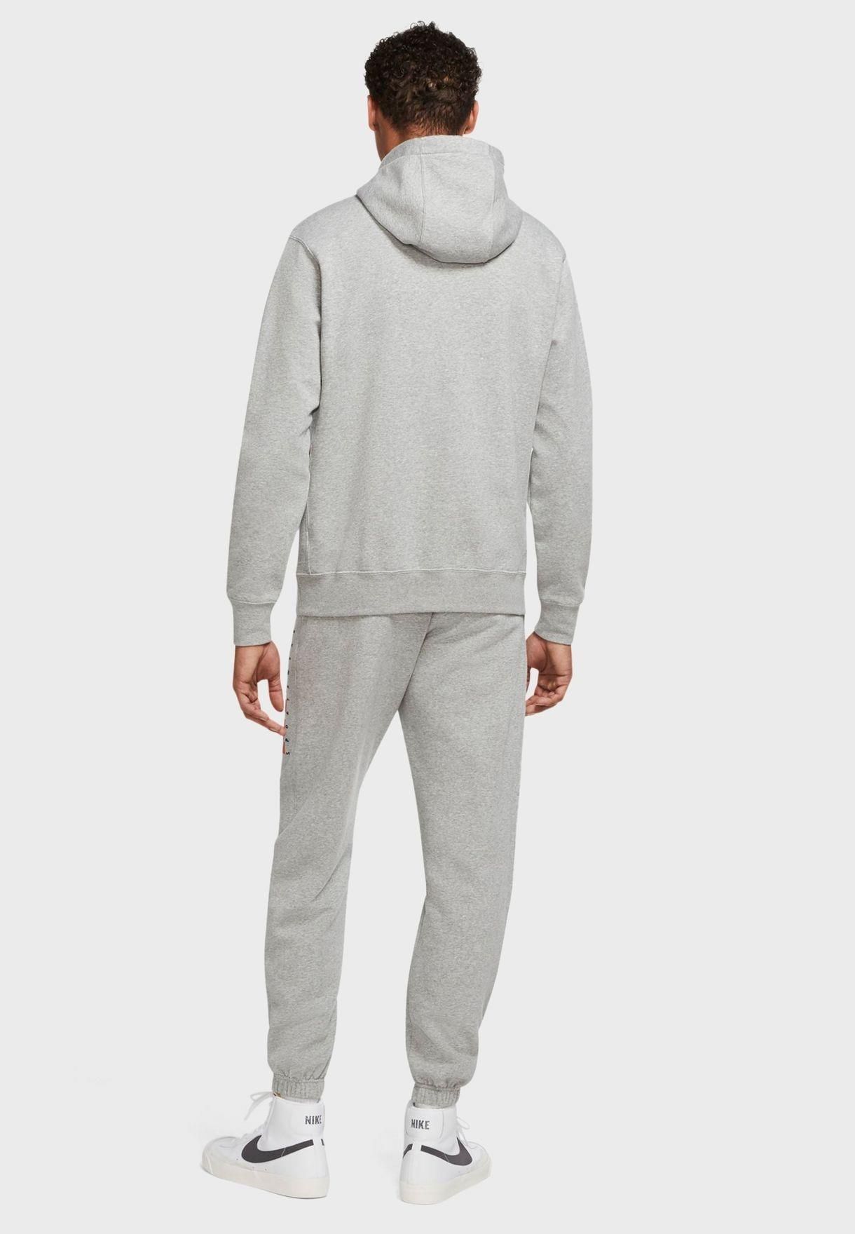 Nike Mens Fleece Hooded Pullover Tracksuit.        
Soft Poly-cotton Blend Light Fleece Fabric.        
Single Pouch Kangaroo Pocket with Dual Side Openings.        
Sweatpants with Elasticised Waist and Hidden Drawstrings.        
Self-Cuffed Hem Joggers.        
Dual Side and Single Wallet Pocket.        
Nike Signature Sportswear Branding Print.