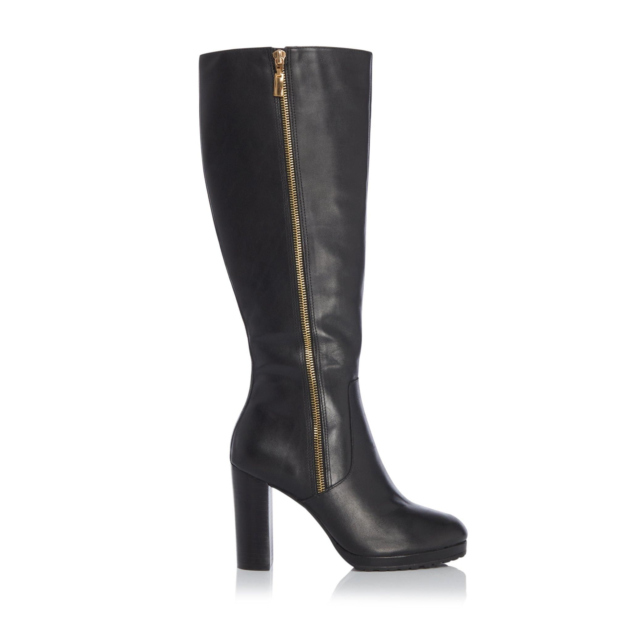 Reach new heights with these classy high-heeled boots. In knee high length with a cleated front sole and block heel. Complete with a gold zip detail and full length zip fastening.