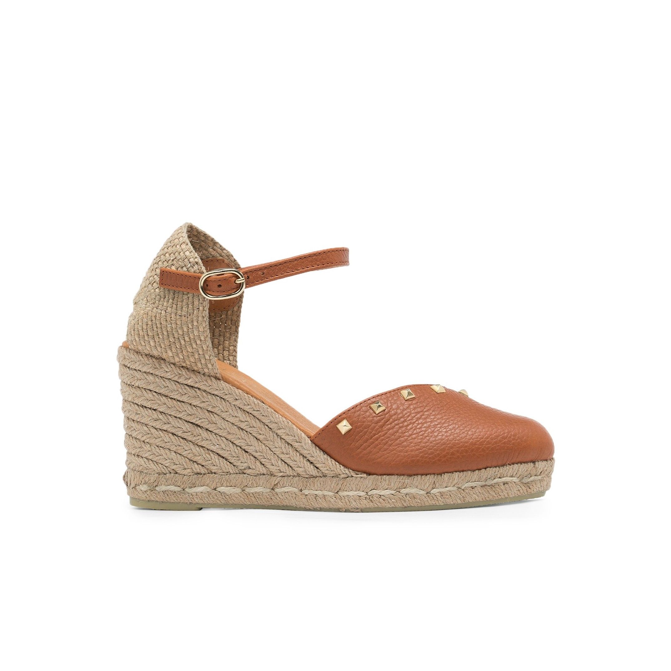 Ankle strap wedge sandals for women. By Eva Lopez Shoes. Upper made of cowhide leather. Metal buckle closure. Inner lining and insole: pig lining. Padded shoe sole: 0.3 cm. Sole material: synthetic. Heel height: 8 cm. Platform: 2 cm Designed and manufactured in Spain.