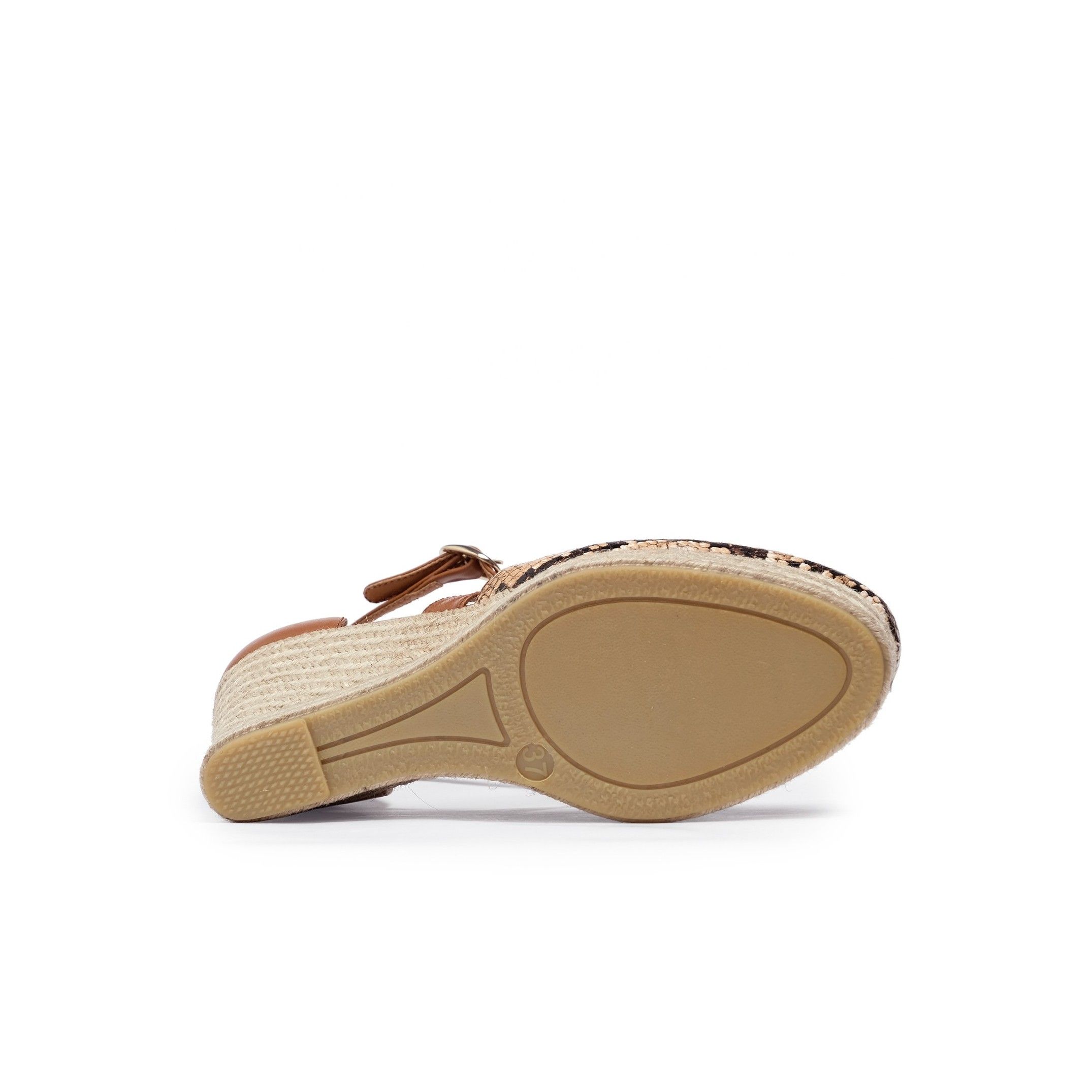 Ankle strap leather sandals with nine strings. Upper made of cowhide leather. Metal buckle closure.  Inner lining and insole: pig lining. Padded sole: 0'3 cm. Sole material: synthetic. Heel height: 8'5 cm. Platform: 2 cm. Diseñado y fabricado en España.