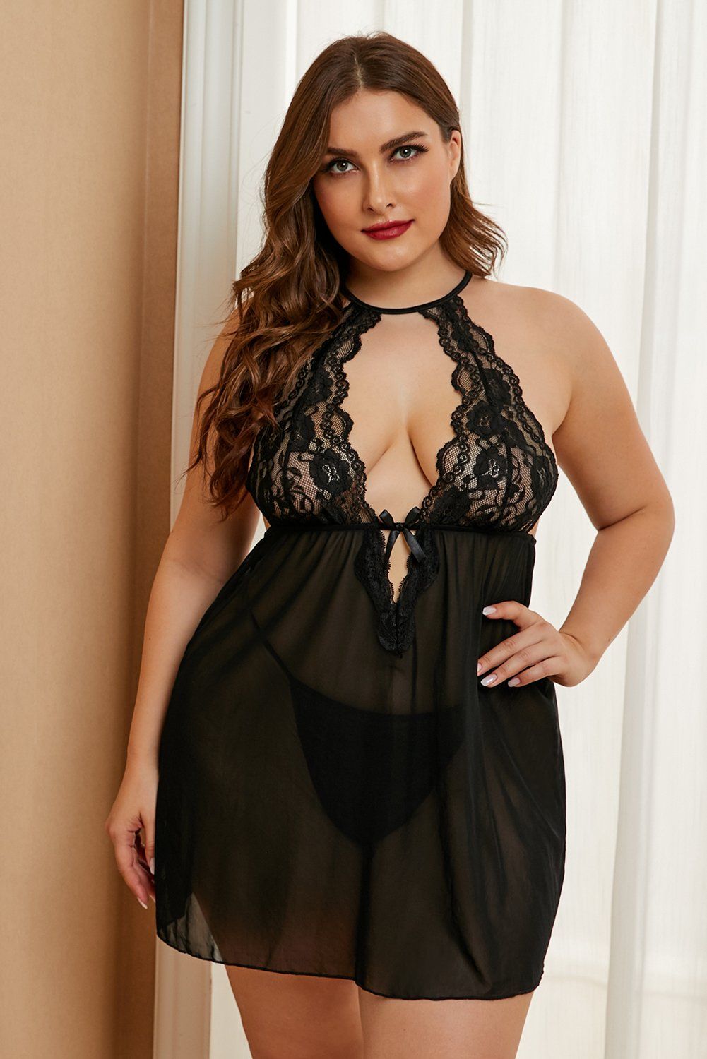 Featuring a sexy front and back cut out. Lace bust and hollow-out back. Ties at the back neck for a flexible adjust. Comes with a matching G-string included. Womens plus size lingerie in lace, satin and chiffon etc..