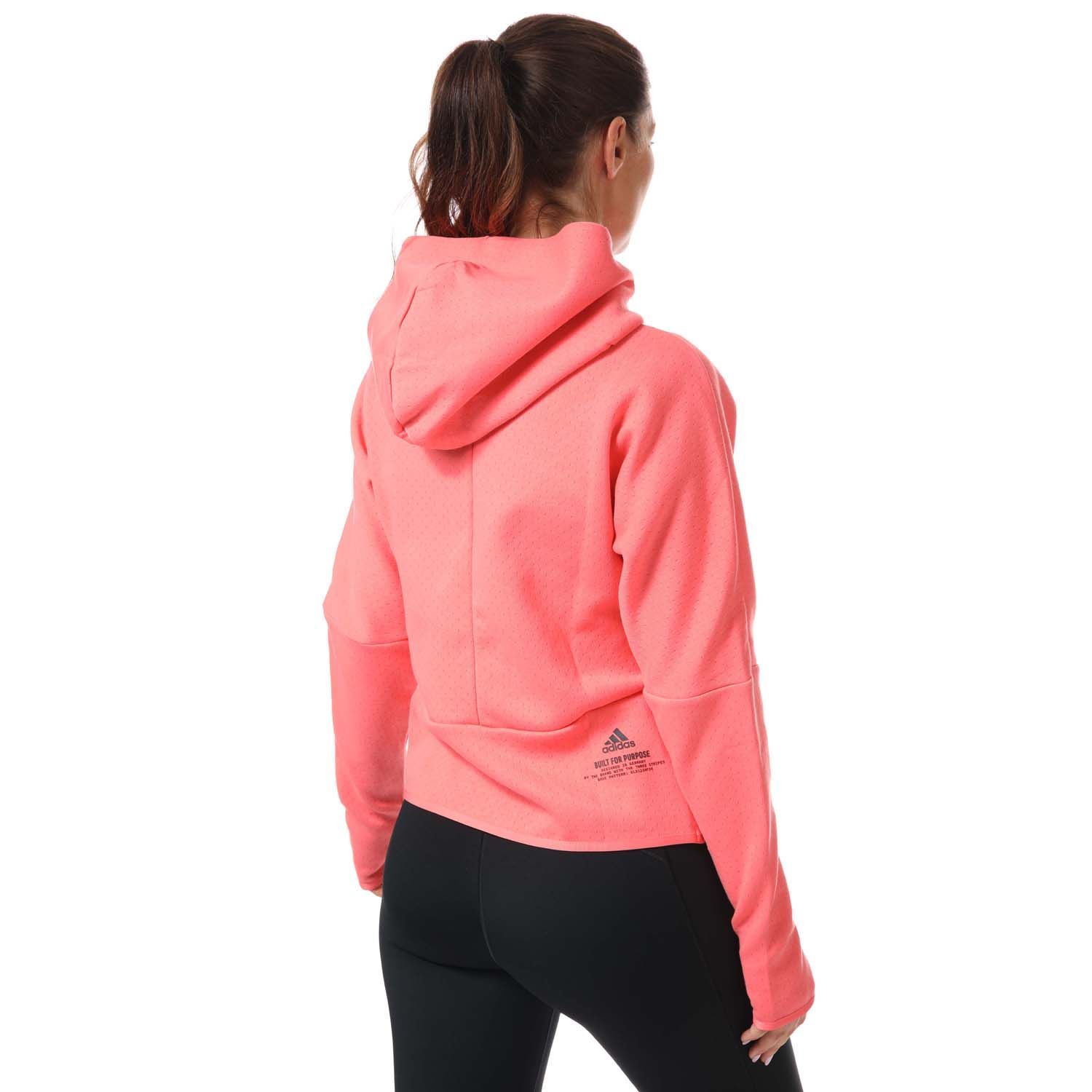Womens adidas Z.N.E. Zip Hoody in coral.-Hooded jacket.- Zip fastening.- Side zip pockets.- Thumbholes.- Relaxed fit.- Body: 60% Cotton  40% Polyester (Recycled). - Ref: GM3280