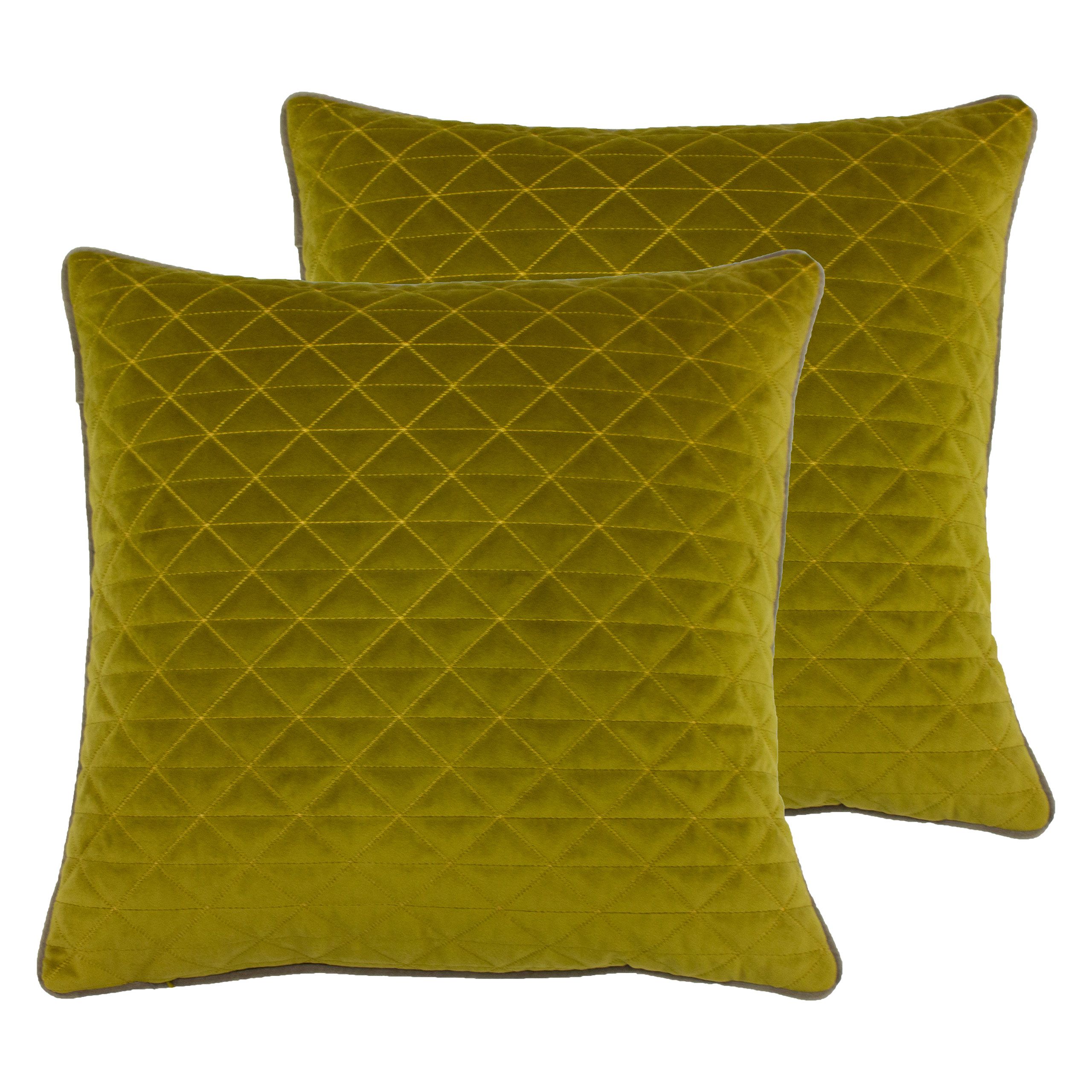 Add a pop of colour to your interior with this luxurious and comforting cushion. The geometric quilted diamond stitch adds a textured appearance that allows the richer hues to instantly pop with the contrasting piped edge and to feel anew against muted and natural-hued furnishings.