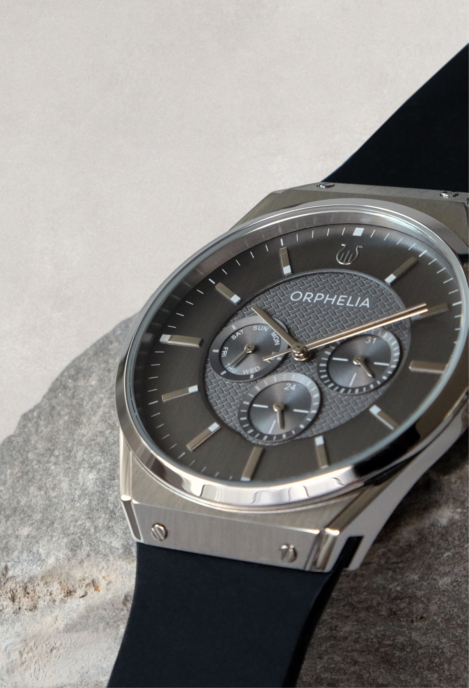 This Orphelia Saffiano Multi Dial Watch for Men is the perfect timepiece to wear or to gift. It's Silver 41 mm Round case combined with the comfortable Black Genuine Leather watch band will ensure you enjoy this stunning timepiece without any compromise. Operated by a high quality Quartz movement and water resistant to 3 bars, your watch will keep ticking. GREAT DESIGN: ORPHELIA Saffiano Multi dial watch with a Miyota Quartz movement includes a date display and has a very comfortable genuine leather strap. This watch features a 24 hour display. perfect for parties, date nights and wearing in the office. PREMIUM QUALITY: By using high-quality materials  Glass: Mineral Glass  Case material: Stainless steel  Bracelet material: Leather - Water resistant: 3 bars COMPACT SIZE: Case diameter: 41 mm  Height: 9 mm  Strap- Length: 22 cm  Width: 20 mm. Due to this practical handy size  the watch is absolutely for everyday use-Weight: 61 g