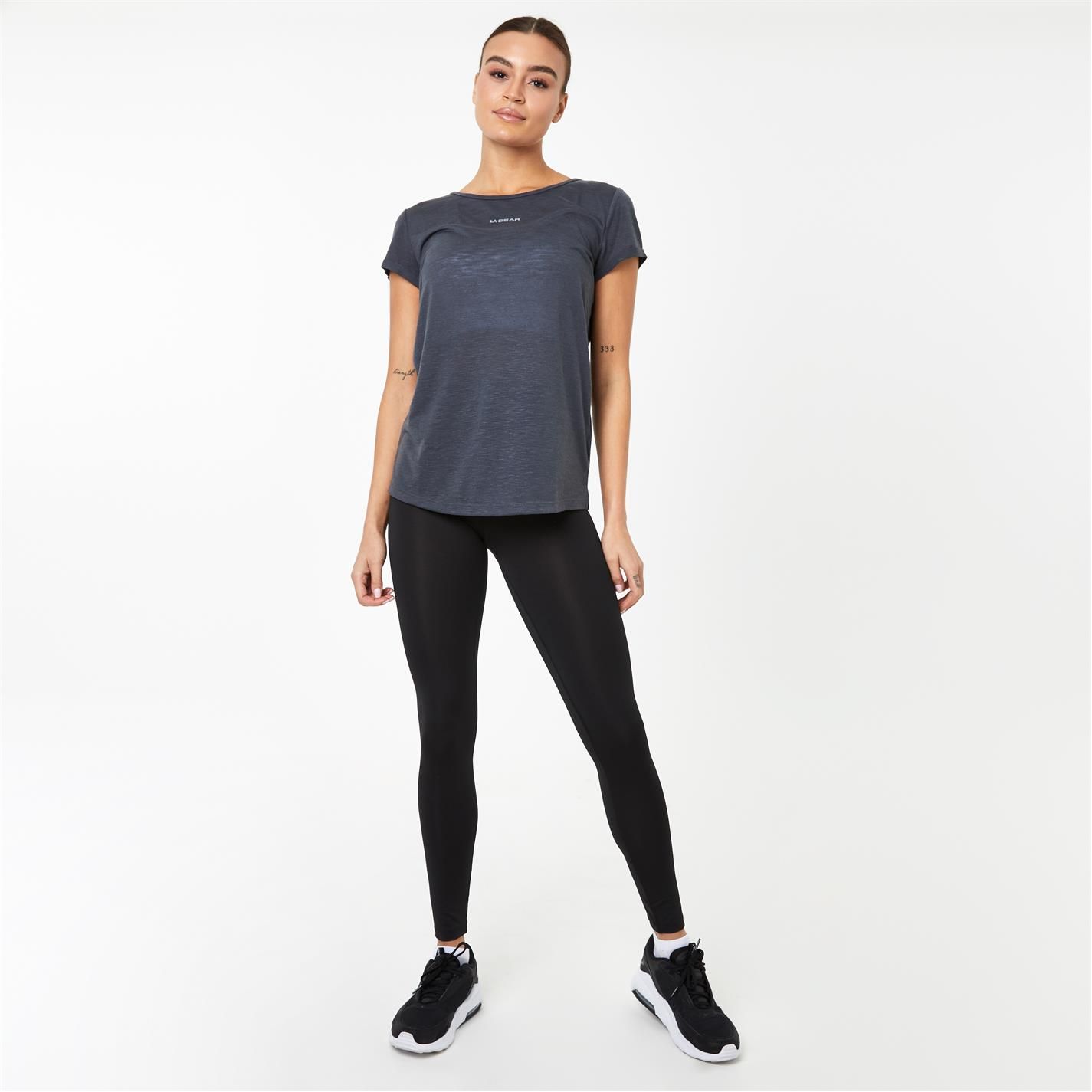 LA Gear Loose T Shirt - This LA Gear longline T-Shirt is a lightweight soft construction, vent detail that features a round neck and capped fold back sleeves. This loose fitting breathable design is complete with flat lock seams to ensure all day comfort. The look is complete with subtle LA Gear branding to one side of the chest to complete the sporty look. 89% polyester 11% viscose. This product may have slight cosmetic differences from the image shown due to assorted colours or updated seasonal collections.