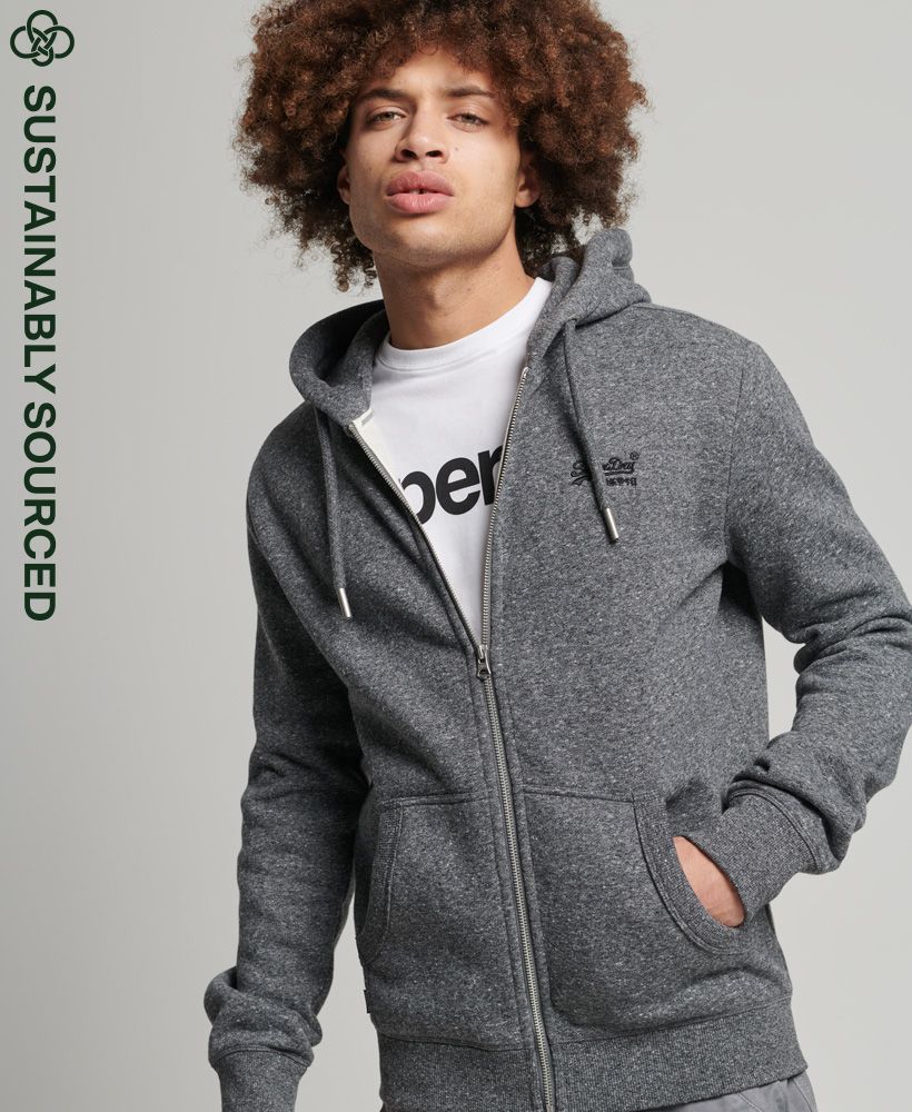 At Superdry, we take a lot of inspiration from the spirit of Americana. Whether you're sporty or enjoy lounging in a cosy hoodie, there's something charming about bundling up as the seasons turn cooler. The Vintage Logo Embroidered Zip Hoodie is one such hoodie with the signature Superdry feel and fashion flexibility.Slim fit – designed to fit closer to the body for a more tailored lookDrawcord hoodZip fasteningLong sleevesFront pouch pocketOrganic cottonEmbroidered Superdry logoSignature Superdry tabMade with organic cotton grown using natural rather than chemical pesticides and fertilisers. The healthier soil this creates uses up to 80% less water which is better for our planet and for the farmers who grow it.