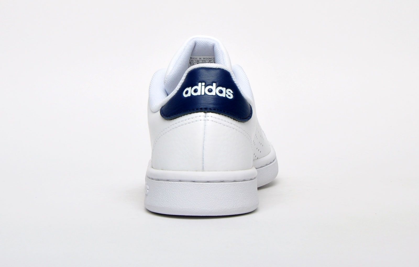 Step out in unbeatable Adidas style with this new in Adidas Advantage lifestyle trainer. These Adidas trainers have a vintage styled throwback court look with improved modern comfort. Designed in an on-trend crisp clean white colourway and detailed with perforated 3-stripes to the side for a luxe designer led finish. The contrasting navy trims show of the visual aesthetics of this classic trainer while the padded heel and ankle collar, plus the super comfy cloudfoam comfort insole moulds the trainer to your foot for superior step in comfort throughout your daily wear.
 - Leather / synthetic upper 
 - Secure up front lace fastening 
 - Cloudfoam cushioned insole offers comfort 
 - Textured vintage styled sole unit
 - Adidas branding throughout
Please Note: 
These Adidas trainers are sold as B grades which means there may be some very slight cosmetic issues on the shoe and they come in a white Adidas box with on most occasions the Adidas brand authenticity details attached to them. There could occasional be issues with wrong swing tags being allocated to wrong shoes by Adidas themselves which could result in some size confusion but you must take the size IN THE SHOE as the size that the shoe actually is ( not what is on the tag ). We have checked most of the shoes and in our opinion, all are practically perfect without any blemishes on them at all and in essence if the shoes did not have the letter B denoted on the swing tag you would presume these were perfect shoes. All shoes are guaranteed against fair wear and tear and offer a substantial saving against the normal high street price. The overall function or performance of the shoe will not be affected by any minor cosmetic issues. B Grades are original authentic products released by the brand manufacturer with their approval at greatly reduced prices. If you are unhappy with your purchase, we will be more than happy to take the shoes back from you and issue a full refund