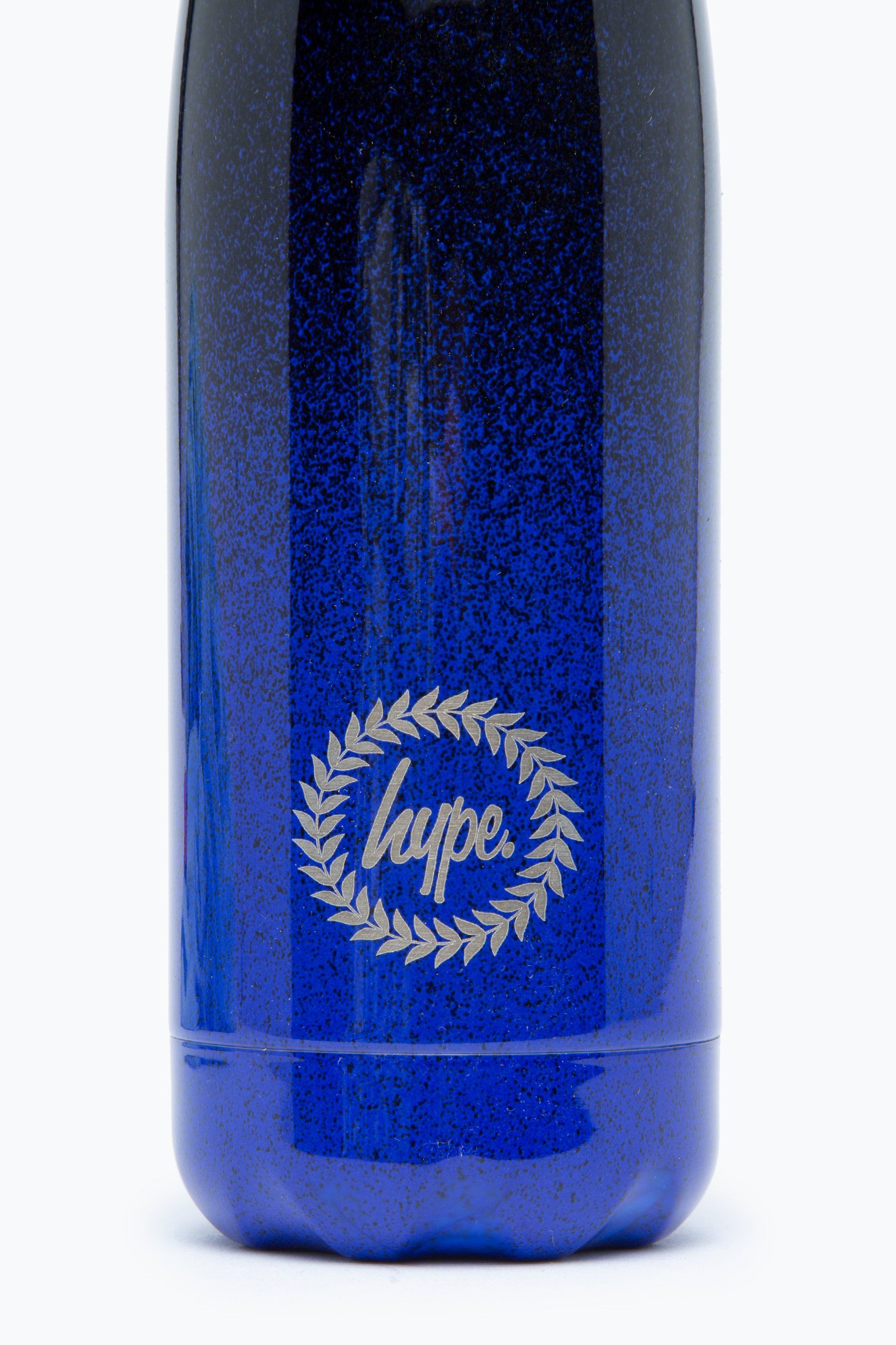 Keeping you hydrated, in style. Meet the HYPE. Blue Black Speckle Metal Reusable Water Bottle, perfect for when you're on the go. With our iconic speckle print in a contrasting white all-over the bottle. Designed in Aluminium to ensure your water stays ice-cold and for chillier days, keeping your oat milk latte warm for longer. Reuse it again and again with an airtight screw lid prevents spills. With an all-over graffiti paint speckle effect in a blue and black colour palette. Why not grab one of our lunch bags or backpacks with a bottle holder to complete the look. Hand wash only.