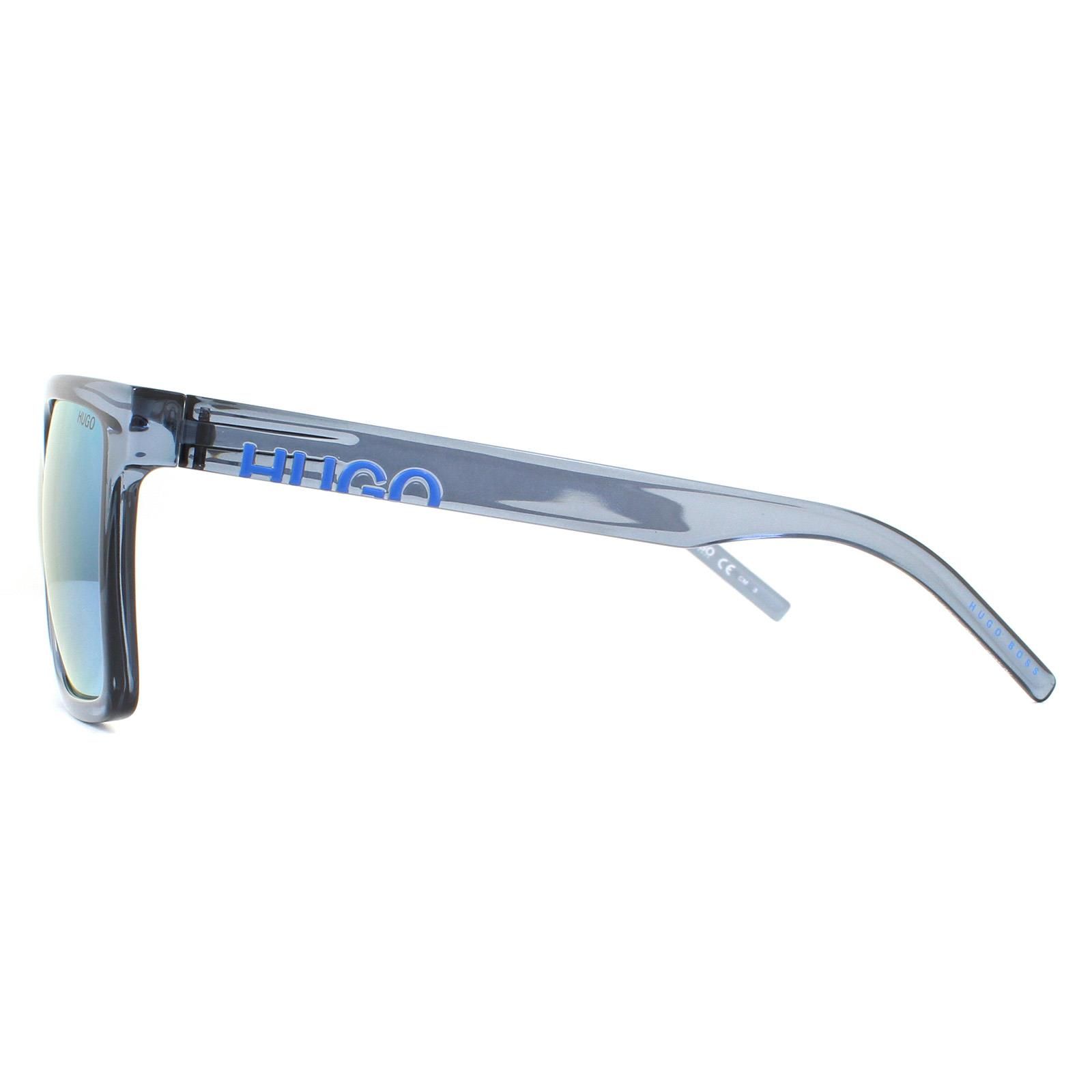 Hugo by Hugo Boss Sunglasses HG 1069/S PJP 3J Crystal Blue Blue Mirror are a large square design made from lightweight acetate. The flat frame top creates a contemporary feel and the temples feature the Hugo logo.