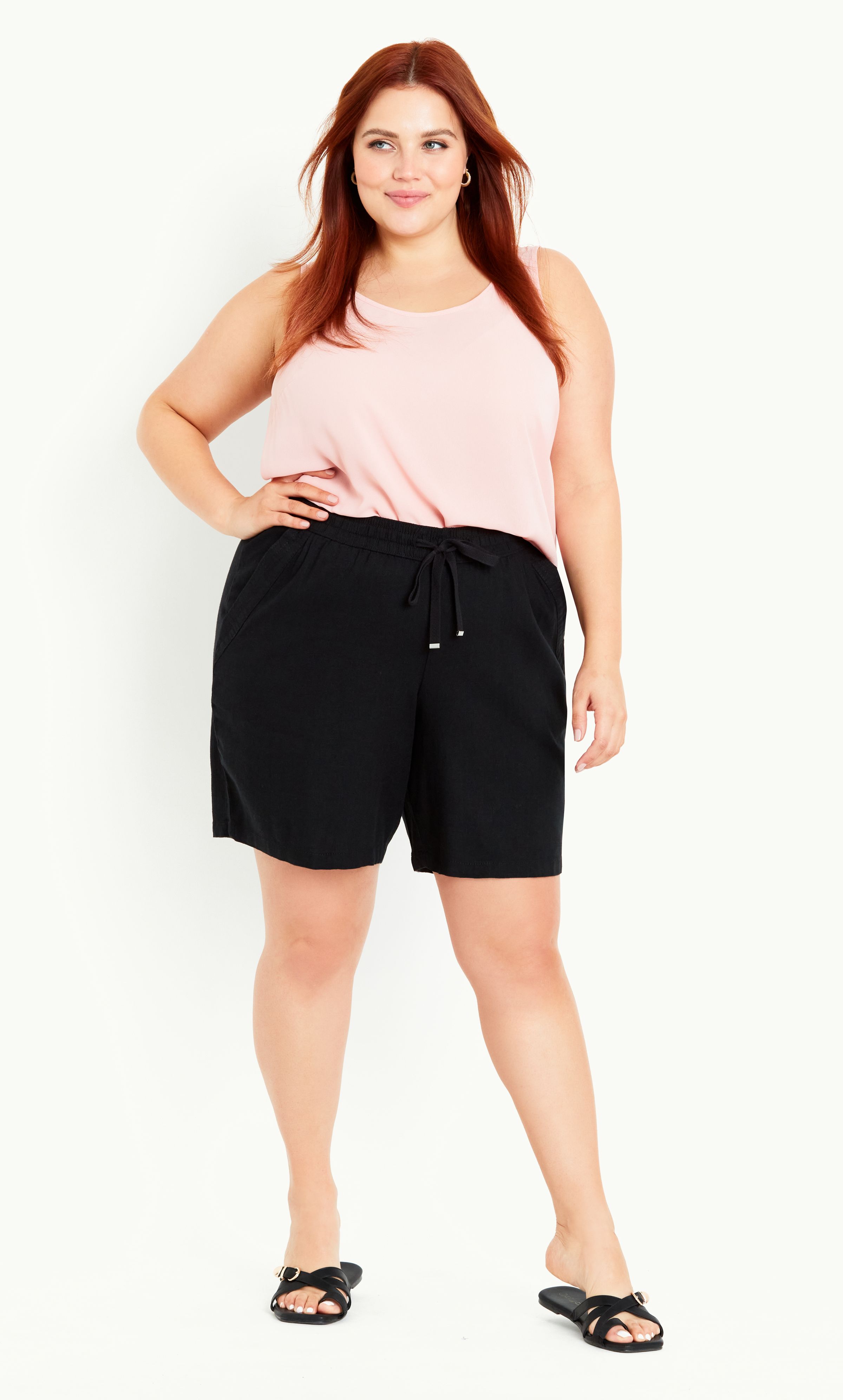 Bring the vacation vibes to your summer style with the Linen Blend Short. Featuring a breezy relaxed fit and functional pockets, these shorts are the perfect blend of comfort and style. Key Features Include: - Elasticated waist with drawstring - Four pockets - Linen blend fabrication - Relaxed leg - Unlined - Pull up style - Above knee length Keep it casual with a white tee and sandals.