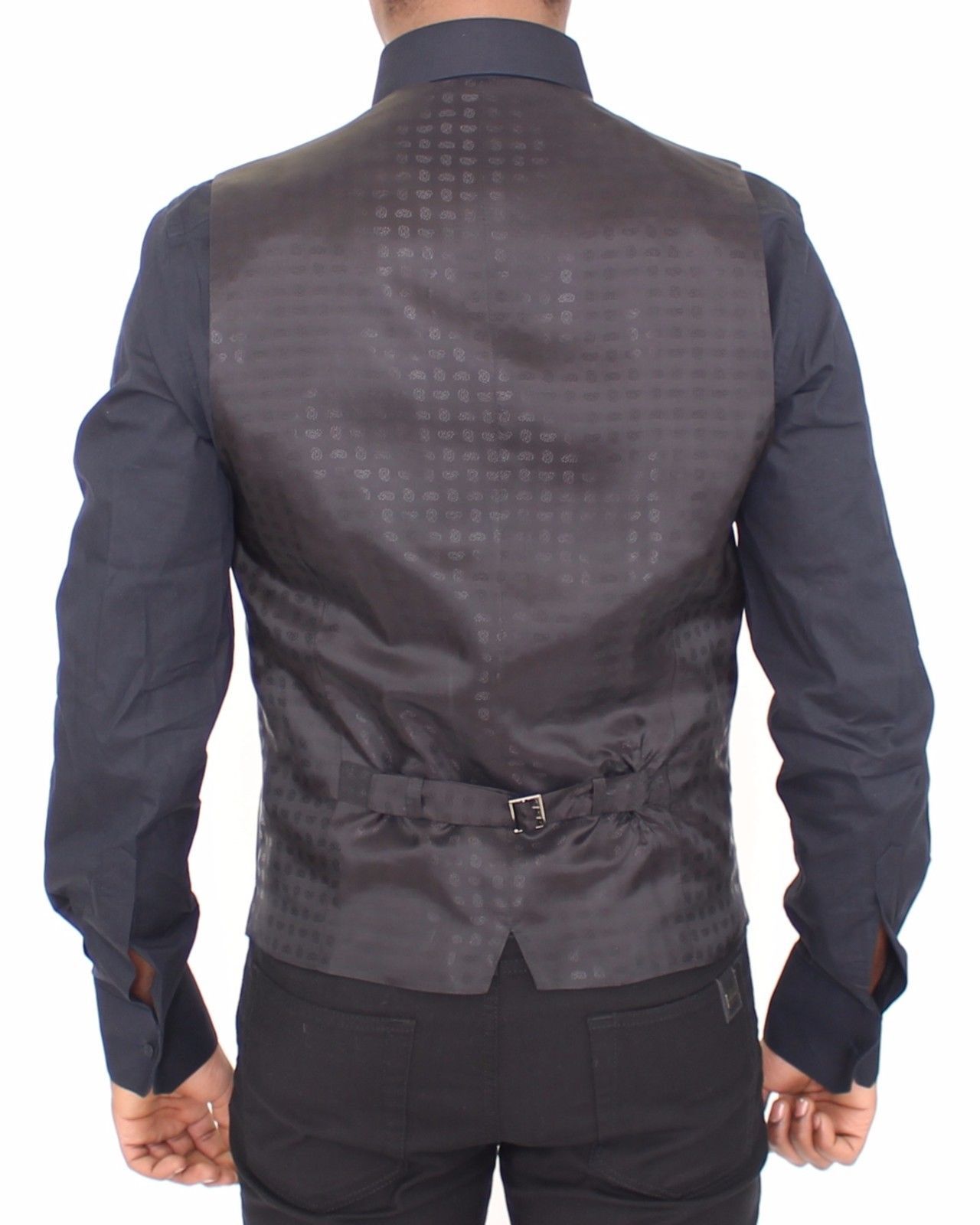 <p>Dolce & Gabbana Vest</p>
<p>Absolutely stunning, 100% Authentic, brand new with tags Dolce & Gabbana black wool silk blend stretch Dress Vest. This item comes from the MainLine Dolce & Gabbana collection.</p>
<p>Modell: Single breasted<br />
Strap: Adjustable back waist strap<br />
Color: Black<br />
Full front button closure<br />
Logo details<br />
Made in Italy</p>