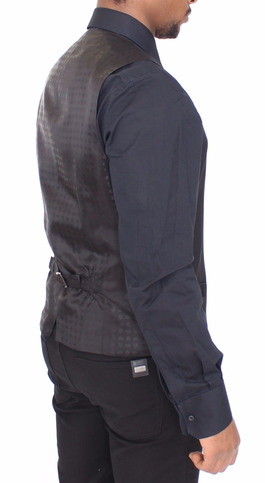 <p>Dolce & Gabbana Vest</p>
<p>Absolutely stunning, 100% Authentic, brand new with tags Dolce & Gabbana black wool silk blend stretch Dress Vest. This item comes from the MainLine Dolce & Gabbana collection.</p>
<p>Modell: Single breasted<br />
Strap: Adjustable back waist strap<br />
Color: Black<br />
Full front button closure<br />
Logo details<br />
Made in Italy</p>