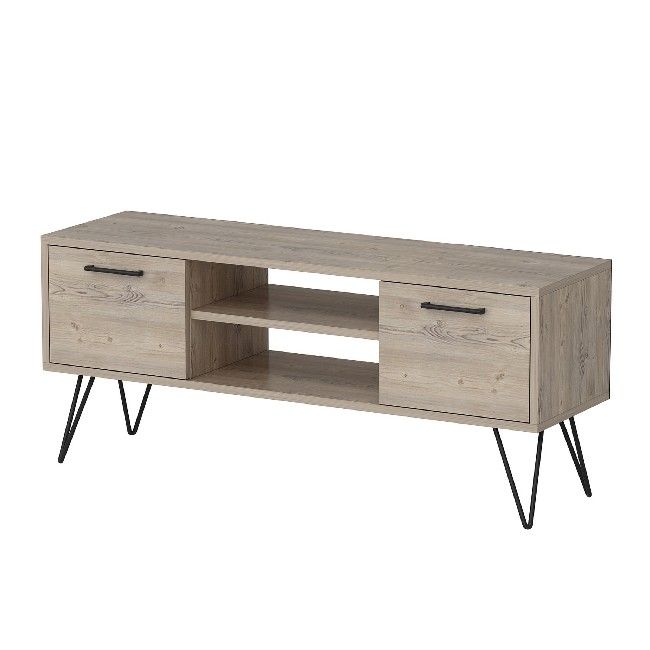This elegant and functional TV cabinet is the perfect solution for television and all digital devices. Suitable for keeping accessories tidy. Thanks to its design it is ideal for the living area. Mounting kit included, easy to clean and easy to assemble. Color: Wood, Black | Product Dimensions: W120xD35xH50 cm, Legs 20 cm | Material: Melamine Chipboard, Metal | Product Weight: 21 Kg | Supported Weight: 15 Kg | Packaging Weight: 23,2 Kg | Number of Boxes: 1 | Packaging Dimensions: W144xD47xH11 cm.