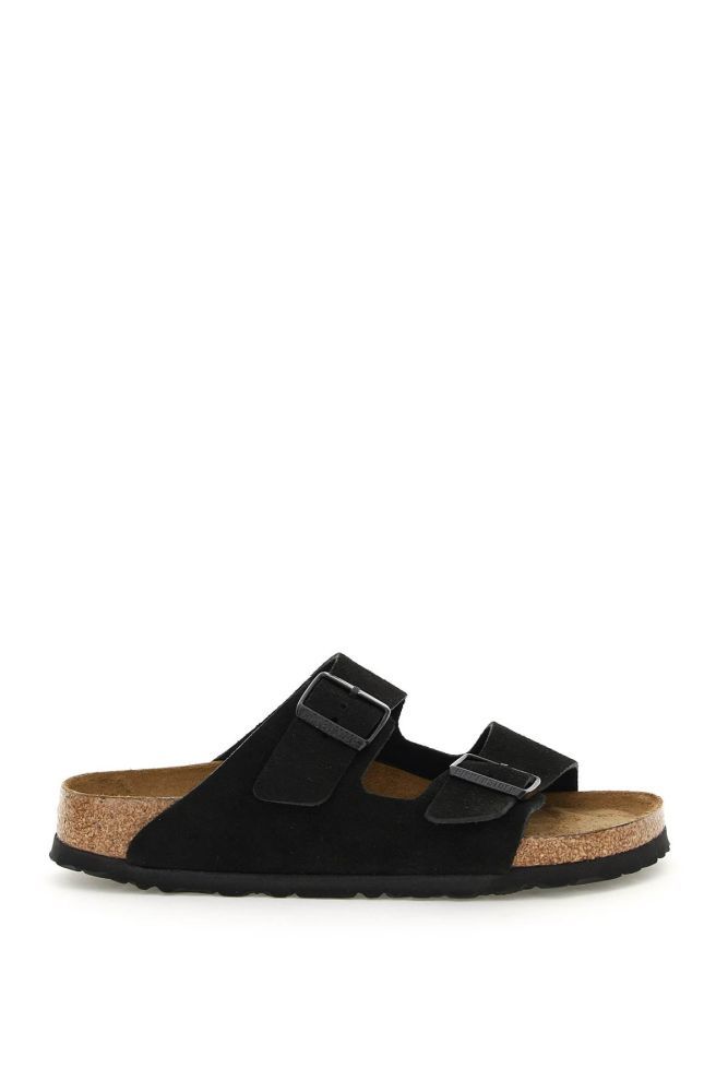 Arizona sandal by BIRKENSTOCK made of suede leather with double adjustable strap with painted metal buckle tone on tone with debossed logo. Suede leather footbed, moulded cork and latex sole and EVA tread. Soft footbed and narrow fit.