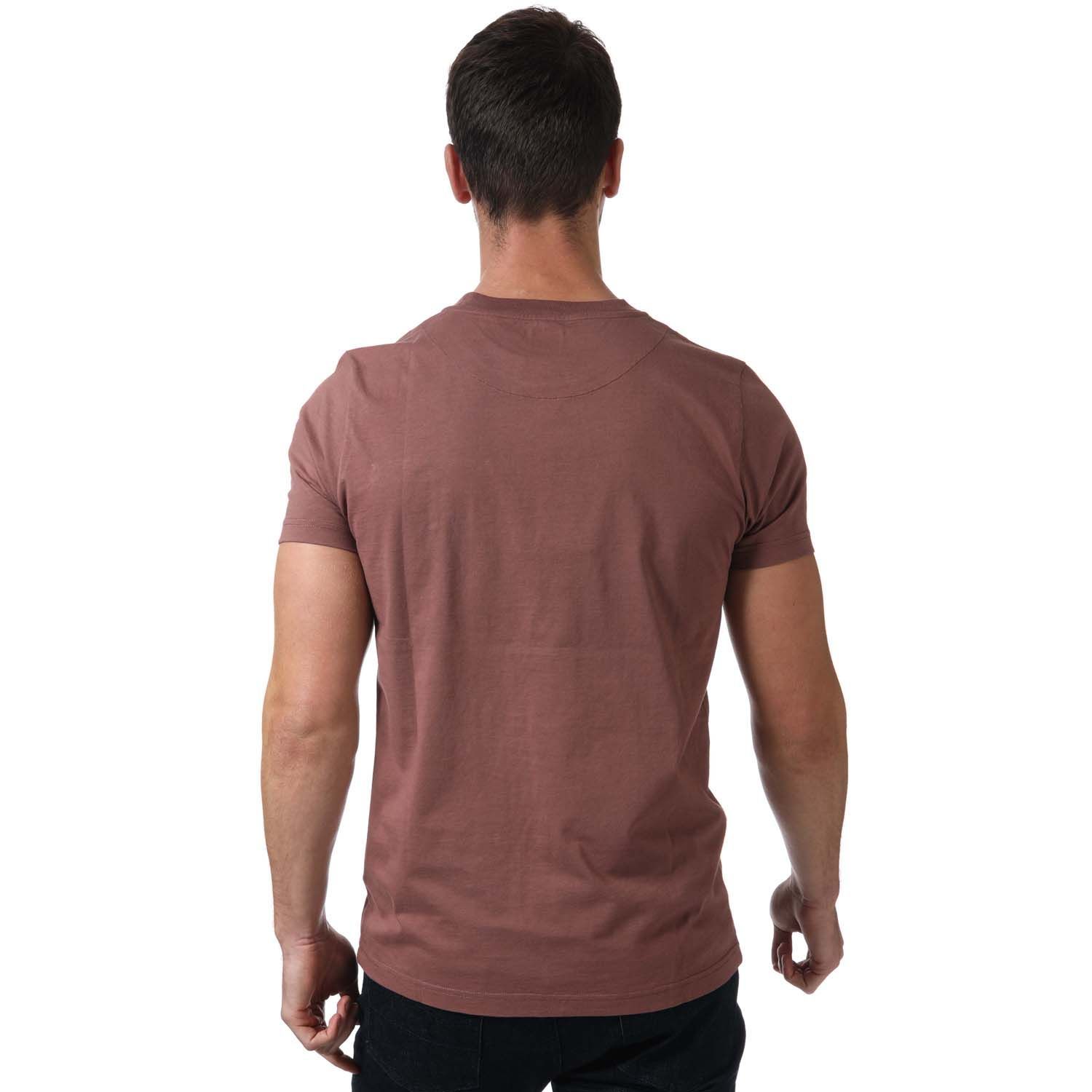 Pretty Green Vega Pocket T- Shirt in burgundy.- Ribbed crew neckline.- Short sleeves.- Pouch pocket is situated on the left of the chest.- Signature Pretty Green logo badge embroidered on top of the pocket.- Regular fit.- 100% Organic Cotton.- Ref:G21Q3MUJER902B