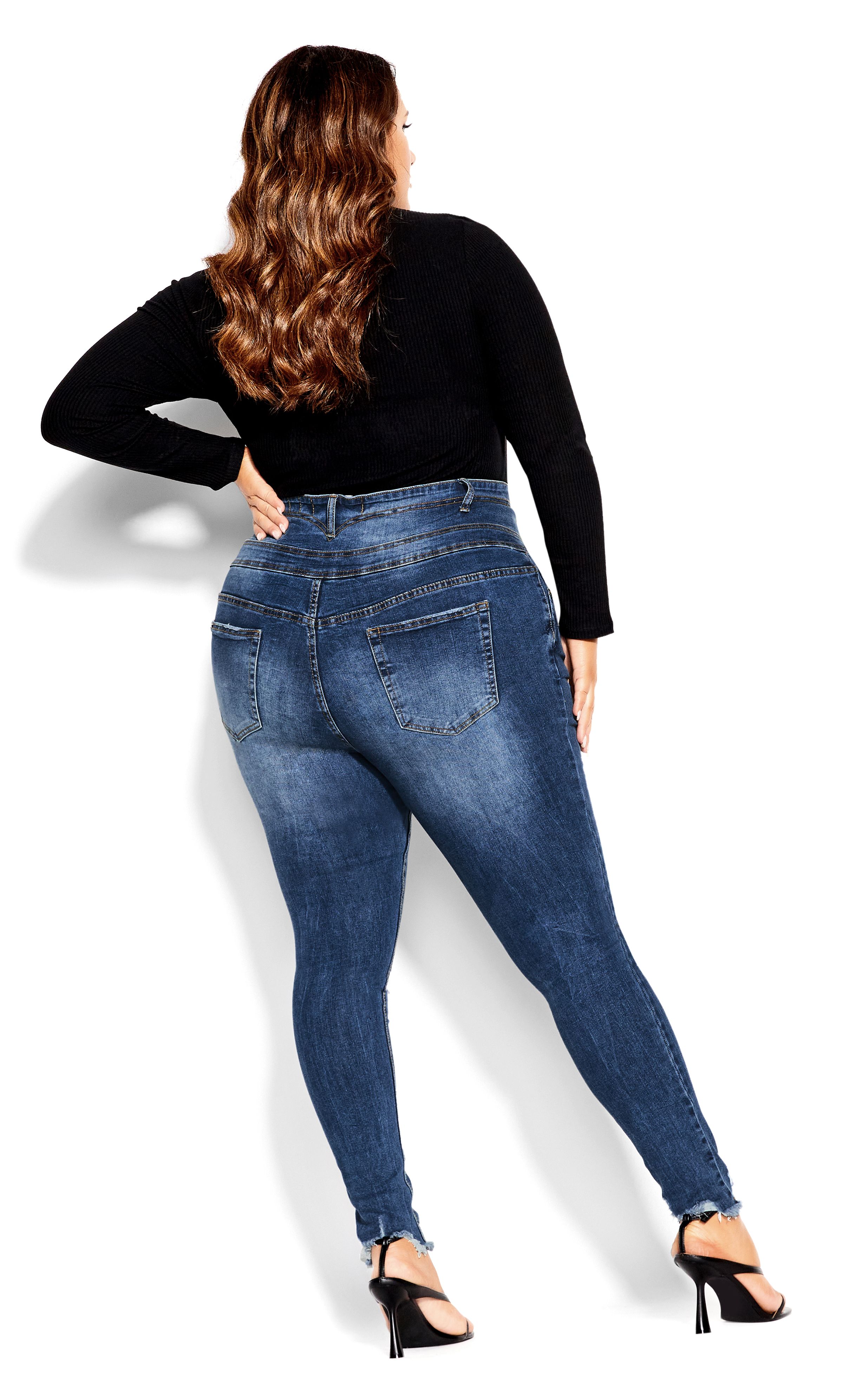 The Asha Trail Blazer Jean has been cut for an apply body figure, flaunting a flattering high rise and skinny leg. In a trendy mid denim with faded detail and distressed touches, these form-flattering jeans tick all the boxes. Key Features Include: - High rise - The perfect fit for an apple body shape - Skinny leg - Quadruple button & zip fly closure - Stretch Cotton blend denim fabrication - High denim fibre retention to maintain shape - Signature Chic Denim hardware throughout zips, buttons and rivets - Distressed detail - Frayed hems - Ankle grazer length Keep it casual with a slogan tee and sneakers for weekend hangs.