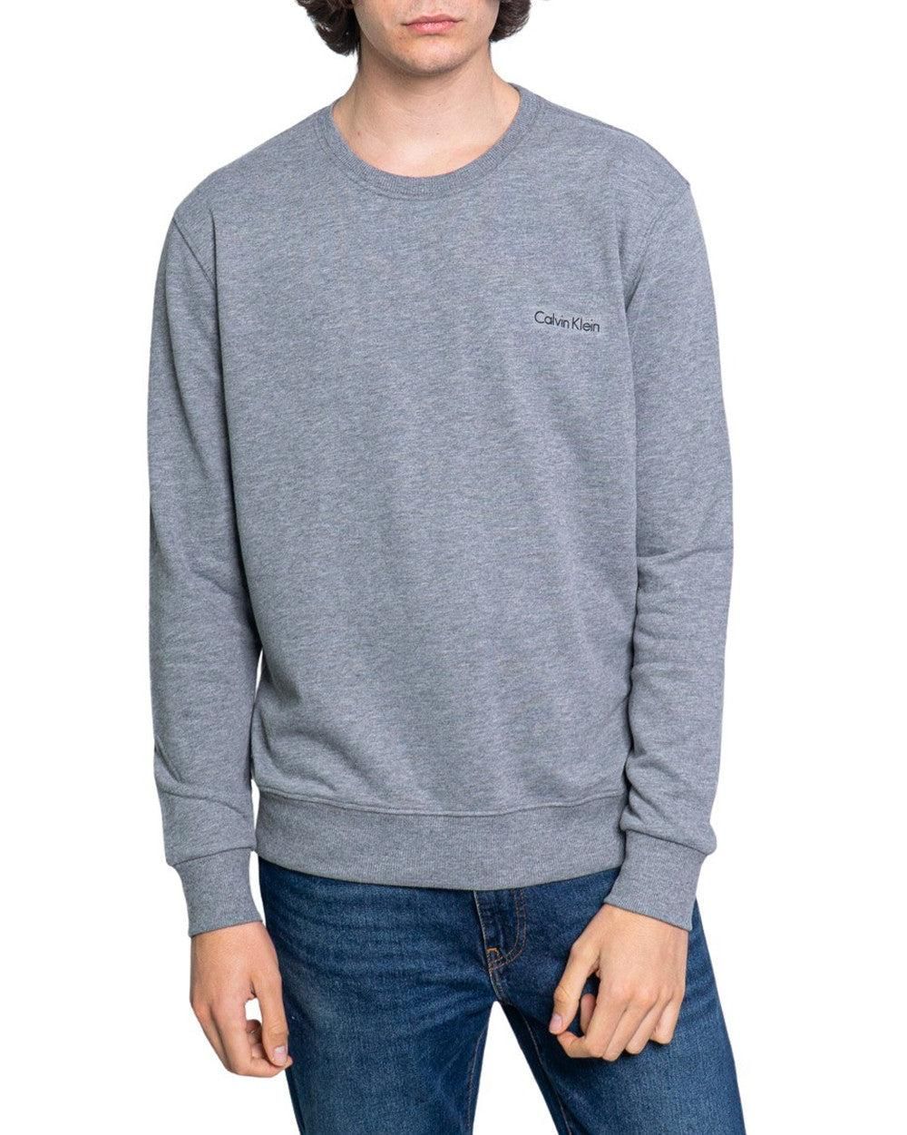 Brand: Calvin Klein Jeans
Gender: Men
Type: Sweatshirts
Season: Spring/Summer

PRODUCT DETAIL
• Color: grey
• Pattern: plain
• Fastening: slip on
• Sleeves: long
• Neckline: round neck

COMPOSITION AND MATERIAL
• Composition: -100% cotton 
•  Washing: machine wash at 30°