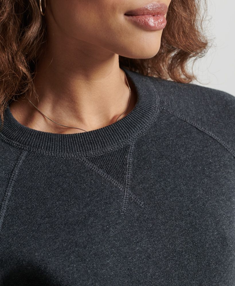 An absolute classic for those lazy days, the Essential Cotton Crew Jumper features a ribbed crew neckline, rib hem and cuffs, and is finished with a signature logo tab.Loose Fit – where comfort meets cool, a stylish loose cut makes this a must-have shapeOrganic cottonRibbed crew necklineRibbed hem and cuffSignature logo tabMade with organic cotton grown using natural rather than chemical pesticides and fertilisers. The healthier soil this creates uses up to 80% less water which is better for our planet and for the farmers who grow it.