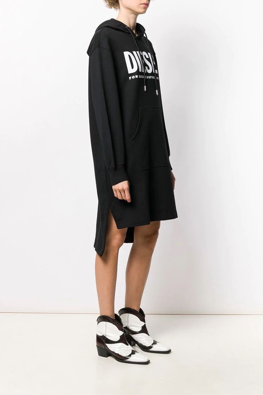 Brand: Diesel Gender: Women Type: Dresses Season: All seasons  PRODUCT DETAIL • Color: black • Pattern: print • Fastening: slip on • Sleeves: long • Collar: hood  COMPOSITION AND MATERIAL • Composition: -100% cotton  •  Washing: machine wash at 30°