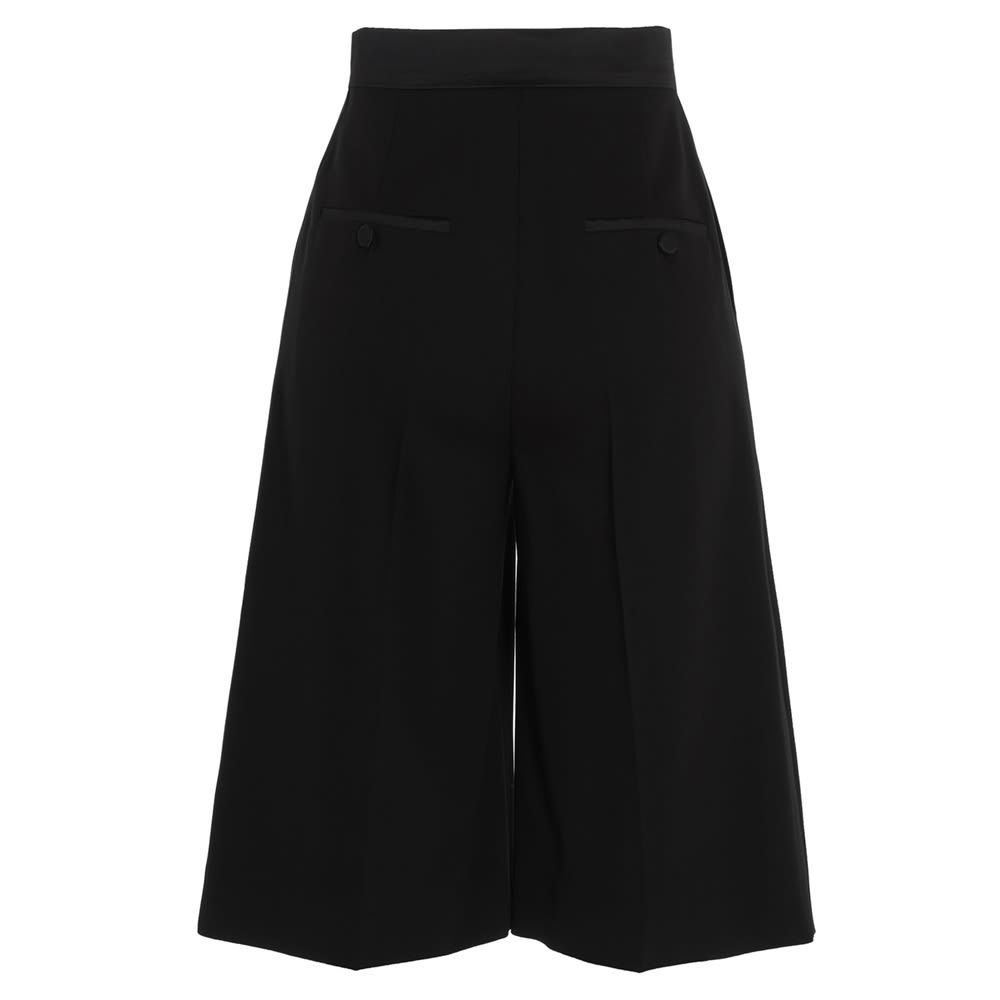 'Etere' virgin wool bermuda shorts with pin tucks, and hook, zip and button closure.