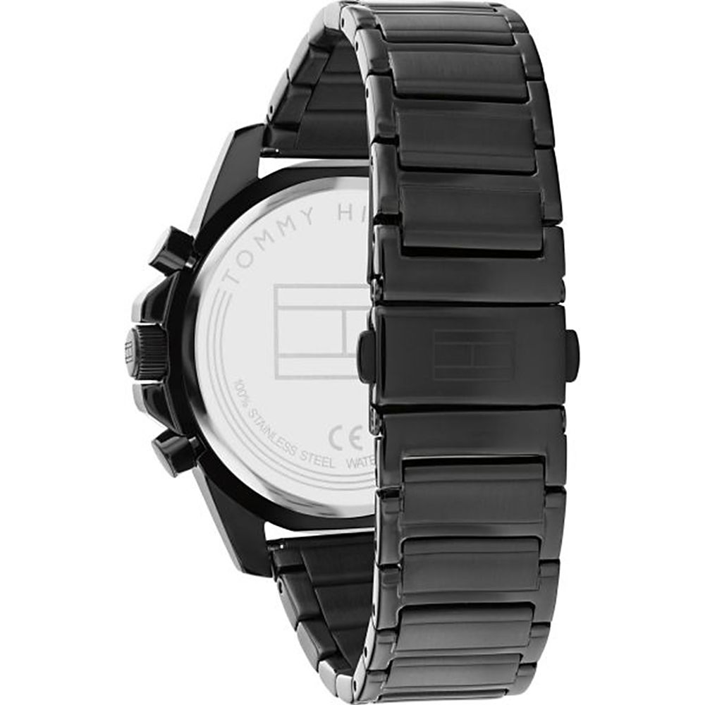 This Tommy Hilfiger Mason Multi Dial Watch for Men is the perfect timepiece to wear or to gift. It's Black 45 mm Round case combined with the comfortable Black Stainless steel watch band will ensure you enjoy this stunning timepiece without any compromise. Operated by a high quality Quartz movement and water resistant to 5 bars, your watch will keep ticking. This fashionable watch with numbers on the bezel is a perfect gift for New Year, birthday,valentine's day and so on -The watch has a calendar function: Day-Date, 24-hour Display High quality 21 cm length and 20 mm width Black Stainless steel strap with a Fold over with push button clasp Case diameter: 45 mm,case thickness: 10 mm, case colour: Black and dial colour: Black