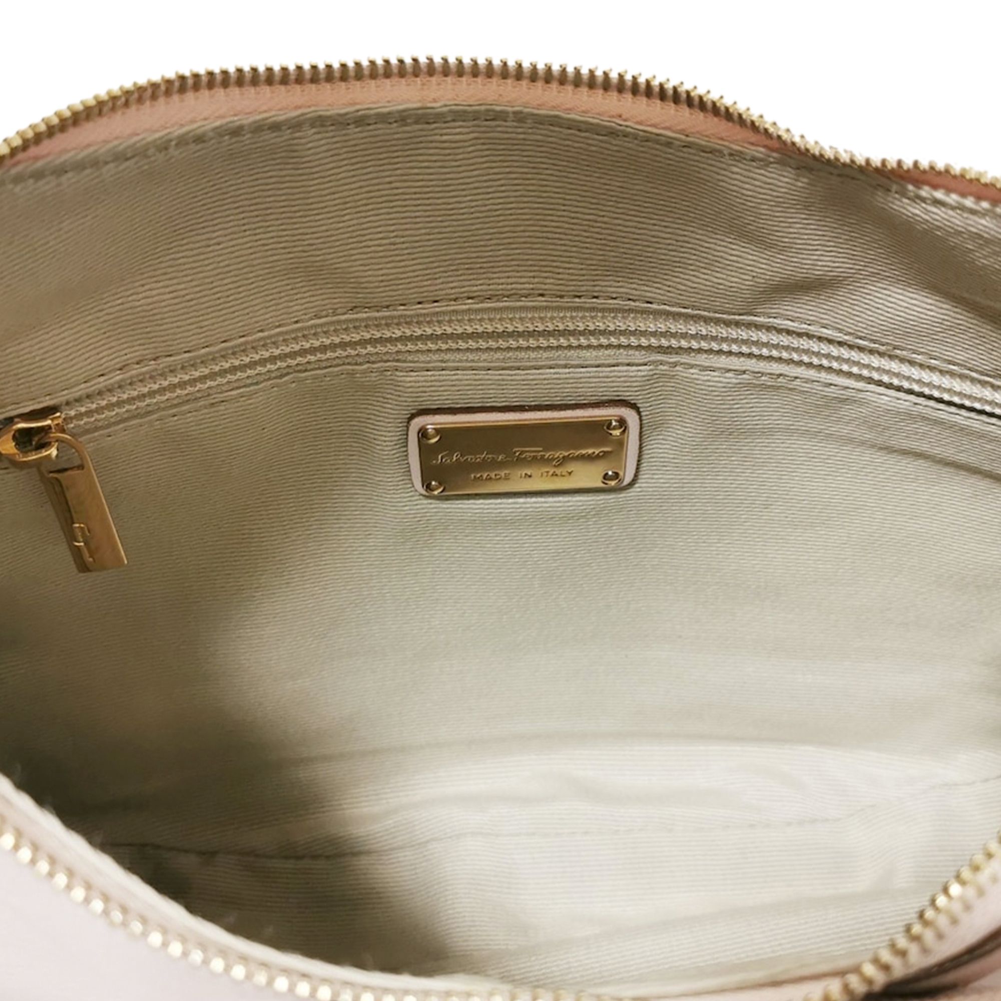 VINTAGE. RRP AS NEW. This shoulder bag features a leather body, a ribbon detail, a flat leather strap, a top zip closure, and interior zip pocket.Exterior front, back and sides are scratched and discolored. Exterior back is discolored and stained with transfer of color. Exterior bottom is discolored. Exterior front is discolored. Exterior handle is discolored, out of shape and stained with transfer of color. Exterior side is discolored. Buckle is scratched. Zipper is scratched.

Dimensions:
Length 20cm
Width 27cm
Depth 4cm
Shoulder Drop 22cm

Original Accessories: Dust Bag

Color: White
Material: Leather x Calf
Country of Origin: Italy
Boutique Reference: SSU125500K1342


Product Rating: GoodCondition

Certificate of Authenticity is available upon request with no extra fee required. Please contact our customer service team.