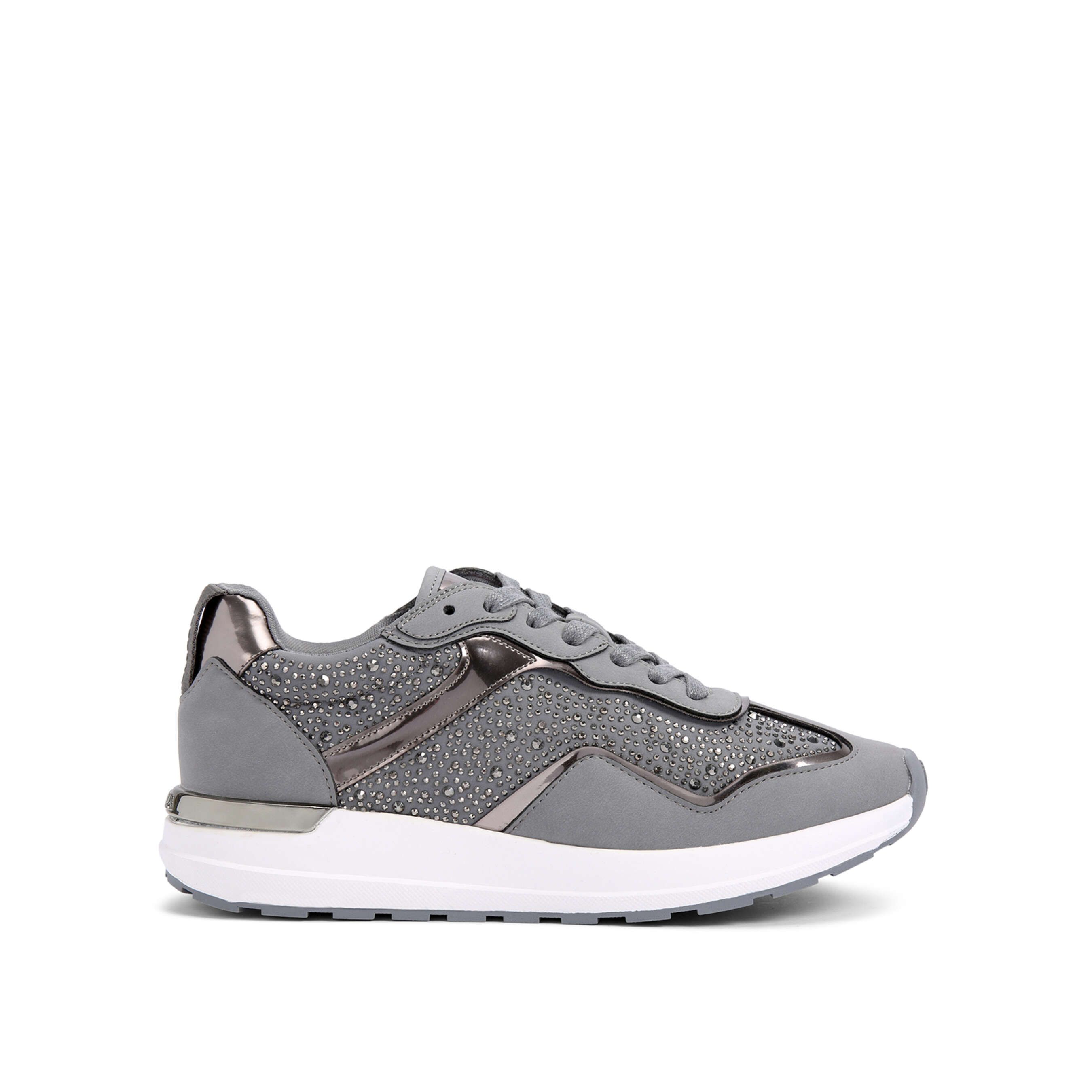 The Blink Jogger features a grey upper with crystal embellishment. There is a silver branded plate at the back of the ankle and the sole is in white.