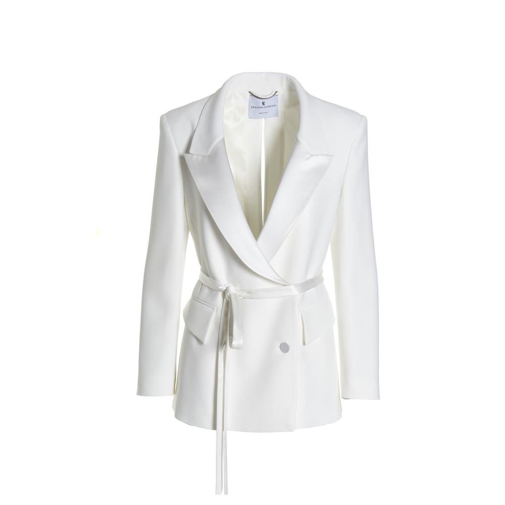 Single-breasted blazer jacket with cut-out detail, long sleeves, padded shoulders and woven belt at the waist.