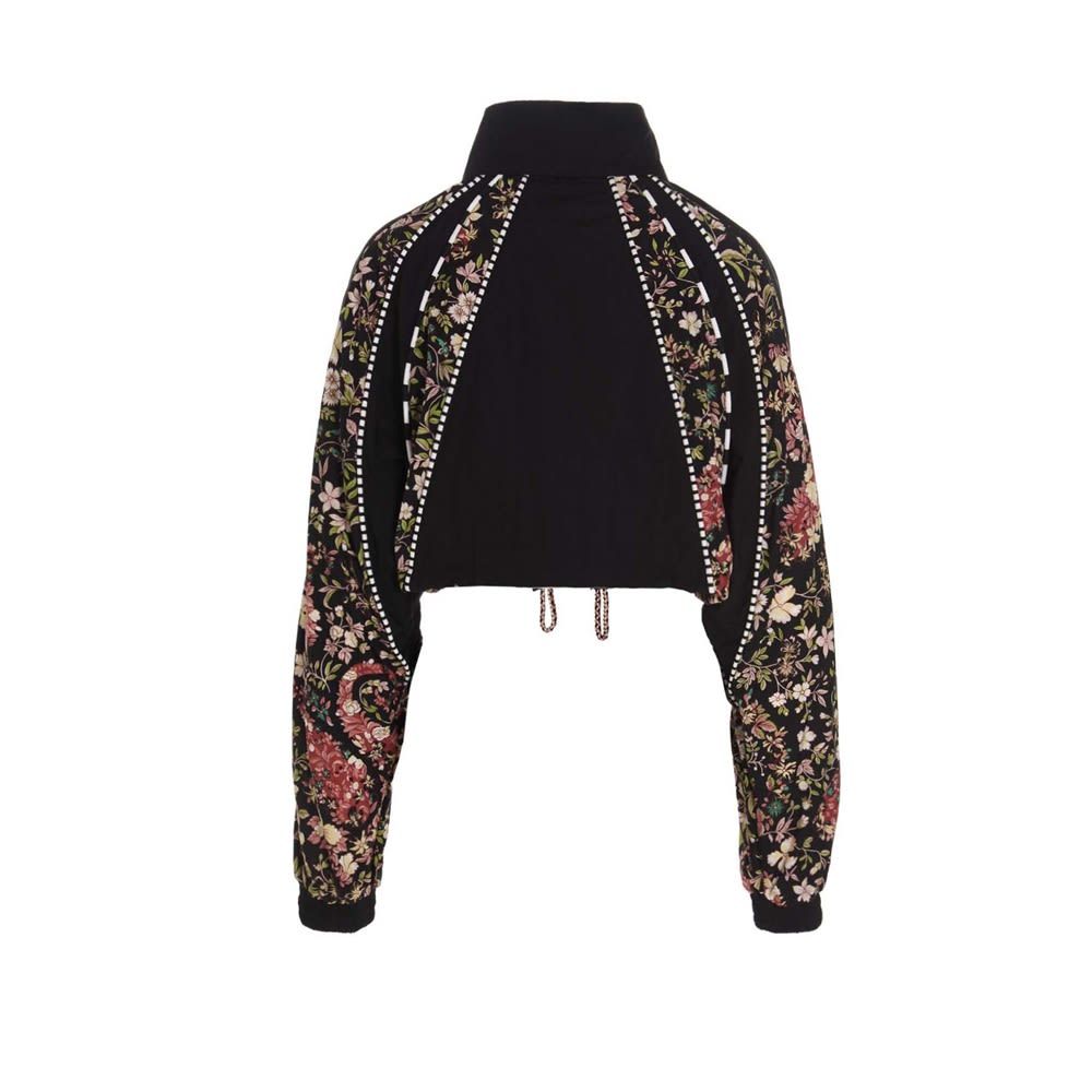 Crop bomber jacket with floral inserts, a drawstring at the waist and a full zip closure.