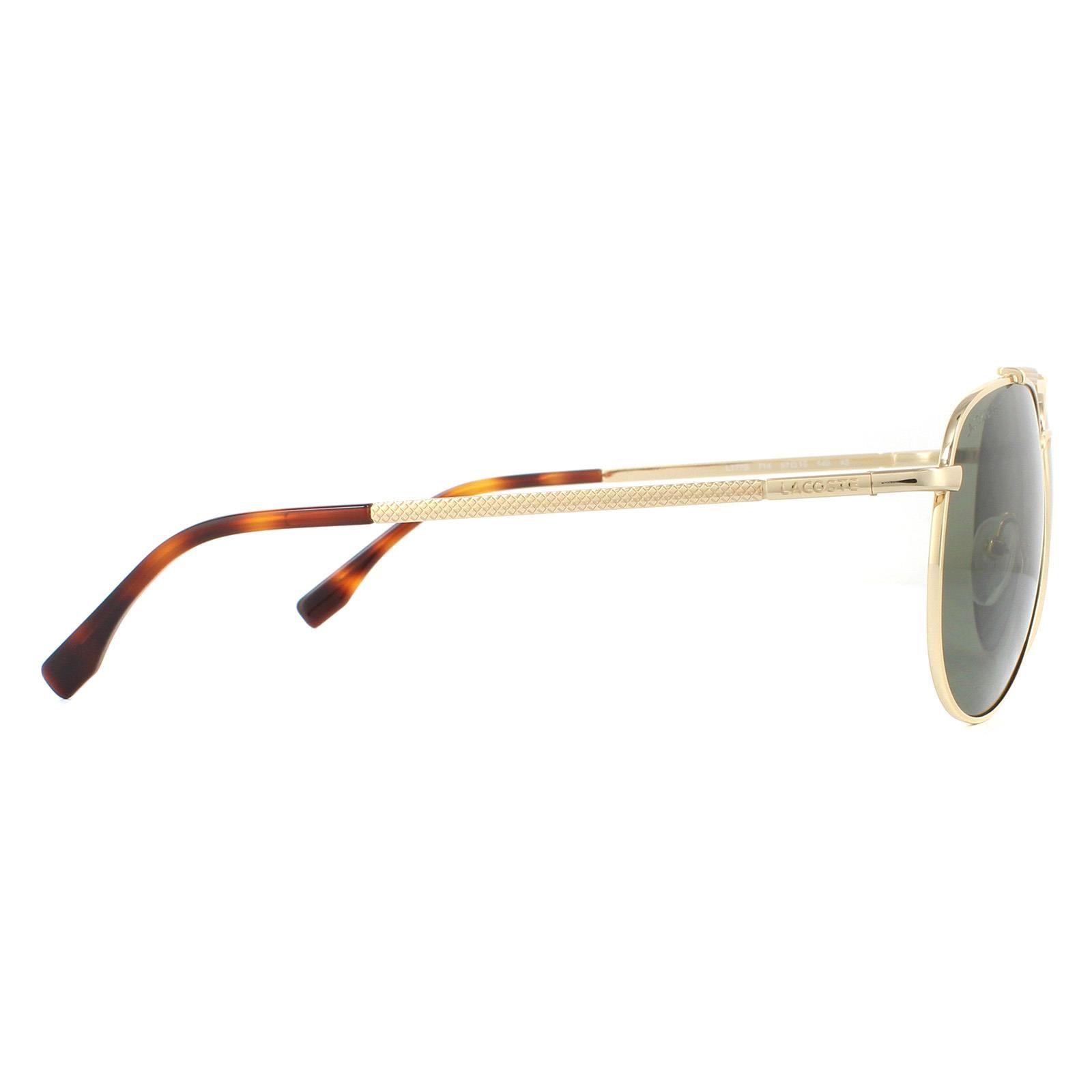 Lacoste Sunglasses L177S 714 Gold Grey are a classy pilot style with textured temples and matching brow bar for a luxurious chic finish. The Lacoste lettered logo at the temples completes these cool aviator Lacoste shades.