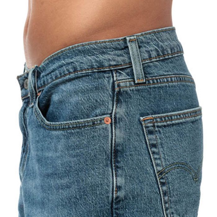 Mens Levi’s 541 Athletic Taper Jeans in blue comet dusk. <BR><BR>A relaxed fit with a slightly tailored finish for comfort and mobility.  Perfect for athletic builds.<BR><BR>- Classic 5 pocket styling. <BR>- Zip fly and button fastening. <BR>- Sits at waist.<BR>- Extra room in seat and thigh. <BR>- Slightly tapered leg.<BR>- Short inside leg length approx. 30in  Regular inside leg length approx. 32in  Long inside leg length approx. 34in.<BR>- 75% Cotton  24% Lyocell  1% Elastane.  Machine washable.<BR>- Ref: 18181-0539<BR><BR>Measurements are intended for guidance only.