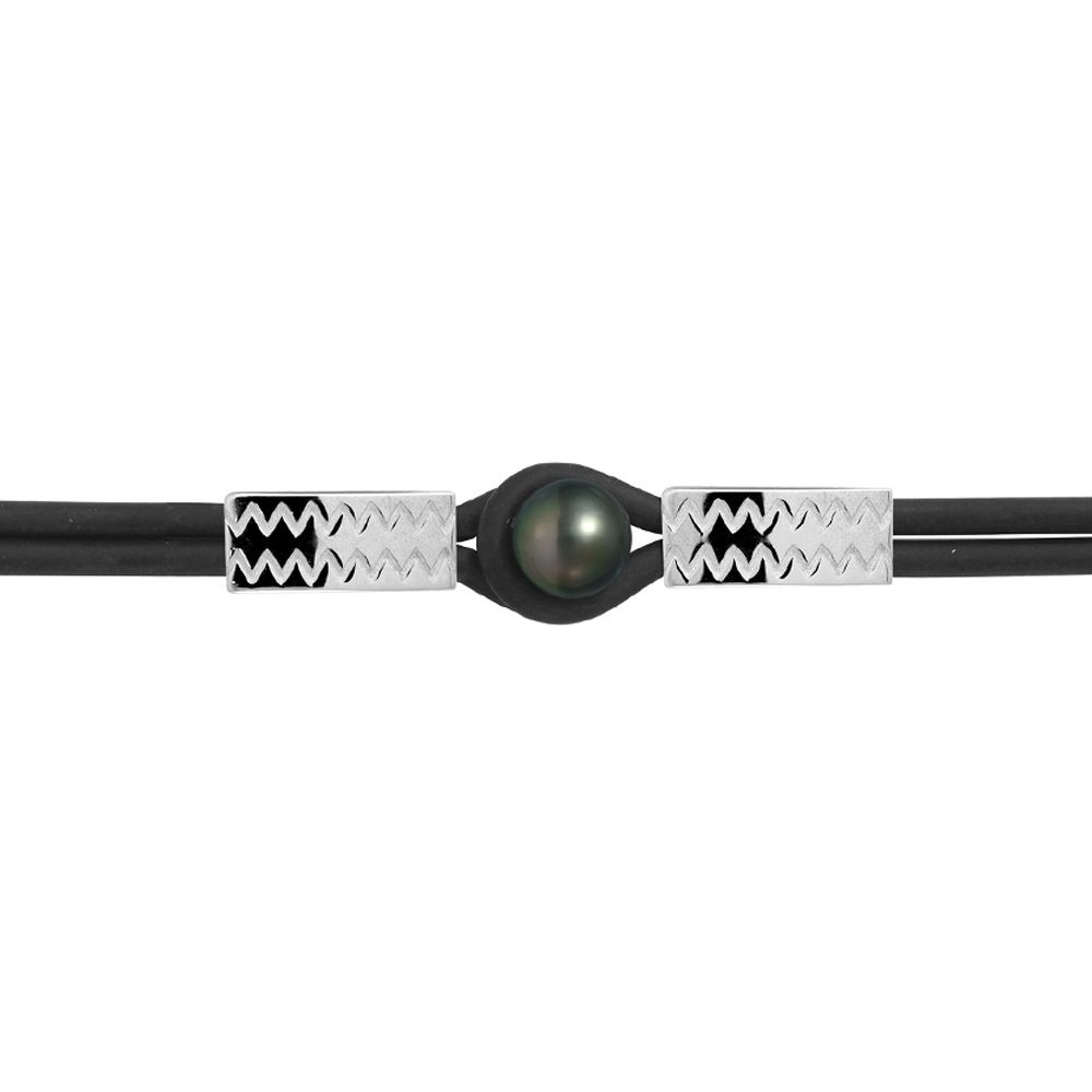 Tahitian Pearl, Neoprene Bracelet and 925 Sterling Silver Made in France Fashionable and Sporty look ! This magnificent neoprene bracelet is composed of a real Tahitian round pearl of 10 mm. The frame is in Sterling Silver 925/1000 for a perfect finish and an extreme shine. Cultured of Tahitian Pearl Pearl shape: round Color : Black Diameter : 10 mm Luster : Excellent Material: Neoprene, 2 rows of 3 mm Mounting: 925/1000 Sterling Silver Draws : waves Weight: 12 gr Length of strap: 19 cm / changeable on request This bracelet suitable for both : men and women ! The bracelet closes on the top thanks to a neoprene buckle surrounding the pearl of Tahiti. Note: This jewel is part of our exceptional range and its production time by our artisans Joailliers can be a little longer than expected: + 24-48h.