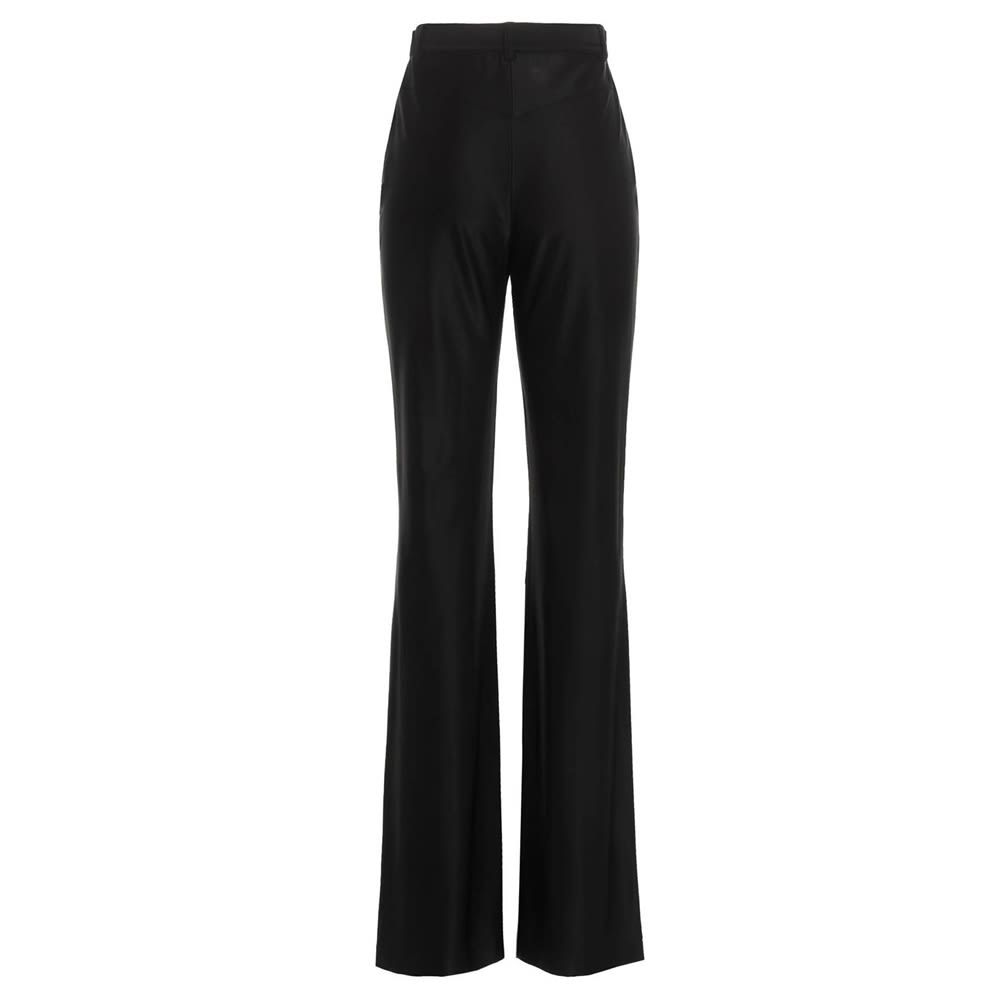 Stretch flared trousers with pockets and zip closure.