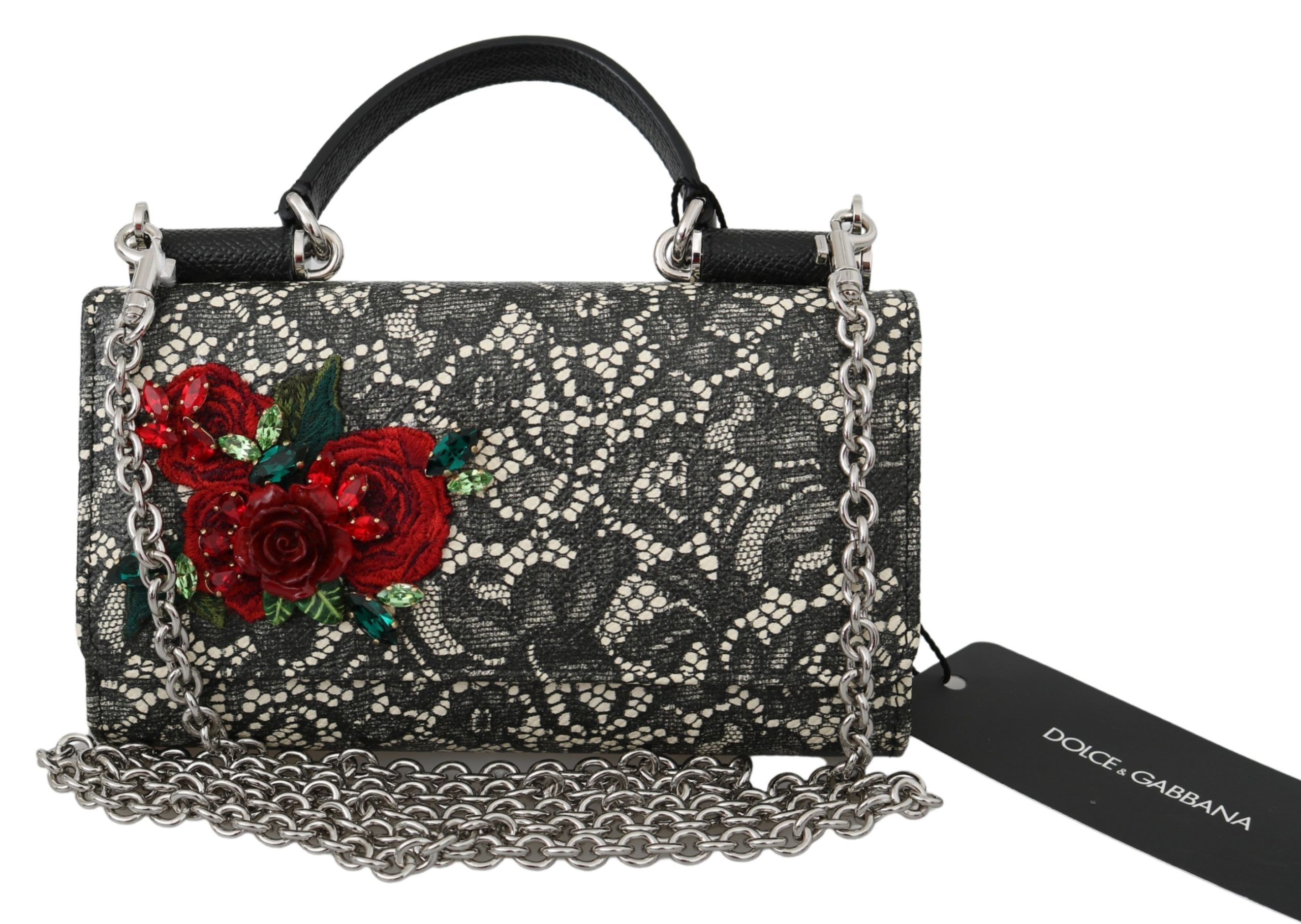 DOLCE & GABBANA
Gorgeous brand new with tags, 100% Authentic Dolce & Gabbana Women Bag.
Model: SICILY VON bag
Material: 60% Leather 20% Nylon 10% Polyester 10% Viscose
Color: Black gray white floral Lace patter
Detachable silver chain strap
Magnetic flap closure
Logo details
Made in Italy
Very exclusive and high craftsmanship
Measurements: 18cm x 10cm x 3cm
Strap: 100cm x 1cm