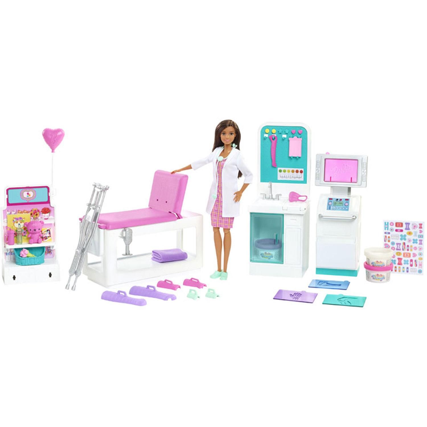 Kids can have all sorts of medicine-themed fun with the Barbie Fast Cast Clinic playset! This playset features a brunette Barbie doctor doll and four play areas - medical station, exam table, X-ray machine, and gift shop - for kids to create their own doctor-patient stories! Kids can make colorful casts for their Barbie doll patients (sold separately) with the cast-making feature. This Barbie playset includes 30+ toy accessories and pieces, including dough containers, crutches, stickers, and more! Makes an excellent gift for kids aged 3+.

​Explore a world of taking care of others with the Barbie Fast Cast Clinic playset
​Wearing a cute plaid dress, white doctor's coat, and sporting a stethoscope and clipboard, the Barbie doctor doll (12-in/30.40-cm) is ready to take care of patients
​Barbie doctor doll can prepare at her medical station, take X-rays and check patients on the exam table
​When she determines a patient has a broken arm or leg, she can make a pink, purple, or white cast with the dough and cast-making accessories! There are also stickers to decorate the patient's cast
​Barbie doctor doll can also use dough in the bandage-making station to create a wrap for her patient injuries as well!
​When she determines a patient has a broken arm or leg, she can make a pink, purple, or white cast with the dough and cast-making accessories! There are also stickers to decorate the patient's cast
​Some of the accessories feature a clip so Barbie doctor doll can hold them for even more realistic play
​Makes a great gift for kids 3 years old and up, especially those interested in the medical field and helping others

Box Contains:
1x Barbie Fast Cast Clinic Playset with Brunette Barbie Doctor Doll
4x Play Areas
30x Play Pieces including dough containers, crutches, stickers, and more