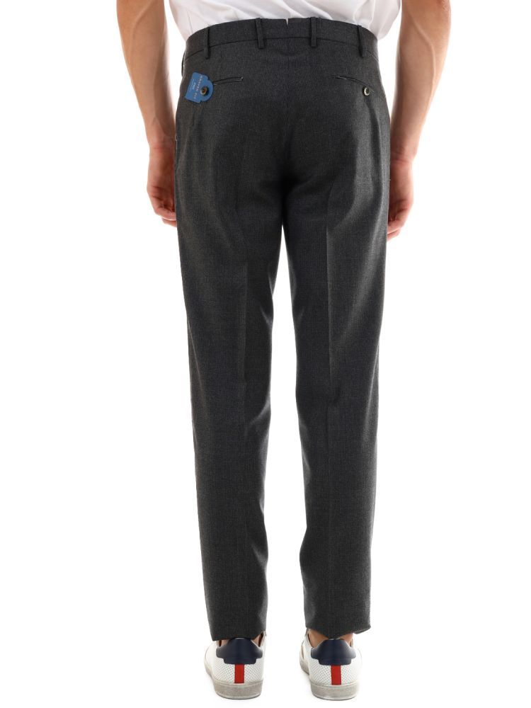 Slim gray wool trousers with side pockets and belt loops at the waist.The model is 1.85 cm tall and wears size 46