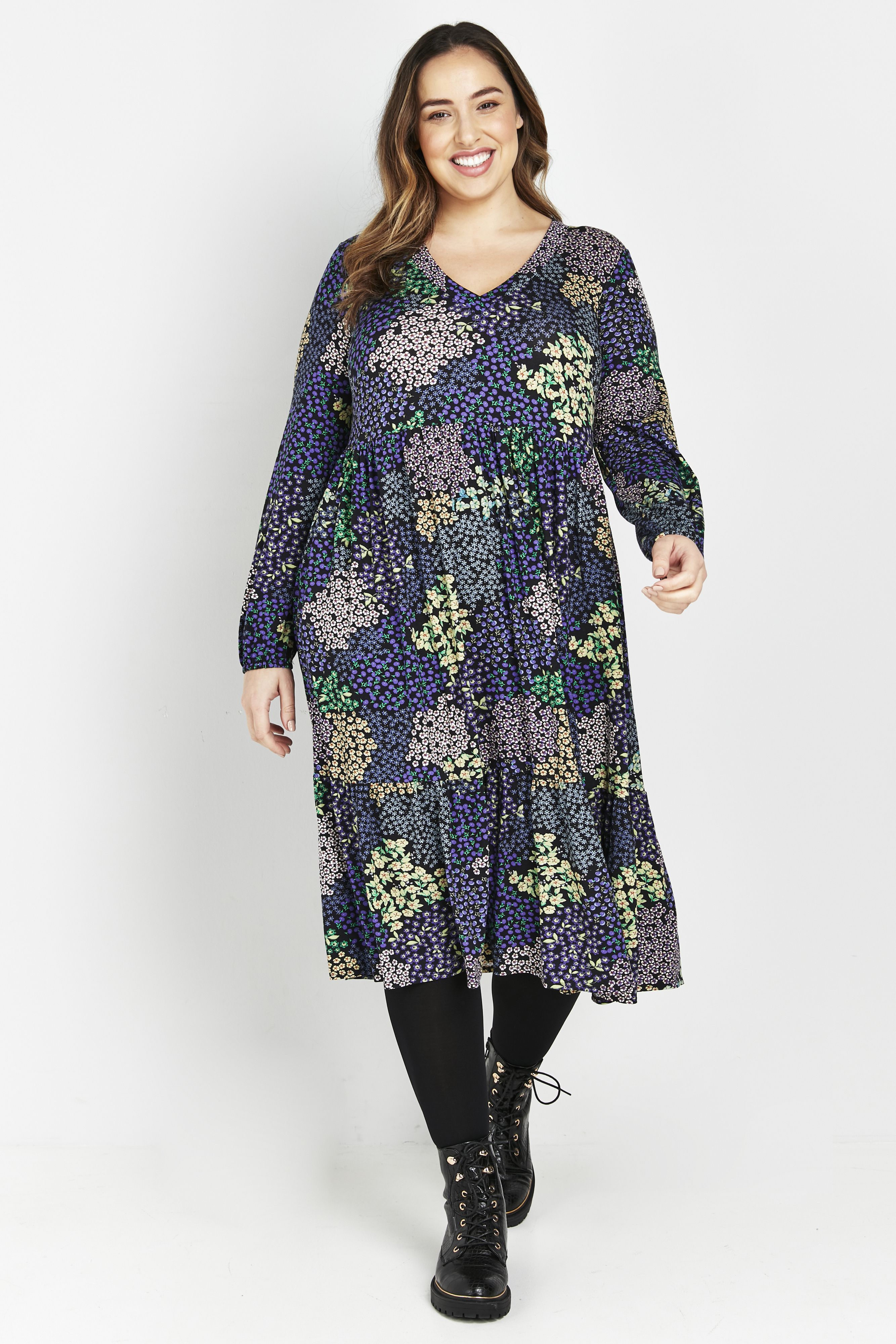 Flirt with florals this season in the cute Patchwork Floral Tiered Dress. A cute patchwork print will bring a pop of colour to your everyday wardrobe, whilst a relaxed floaty fit will have you wearing it on-repeat. Key Features Include: - V-neckline - Long sleeves - Functional side pockets - Relaxed fit - Midi length tiered skirt Style with tights and heeled ankle boots for a playful & effortless everyday look.