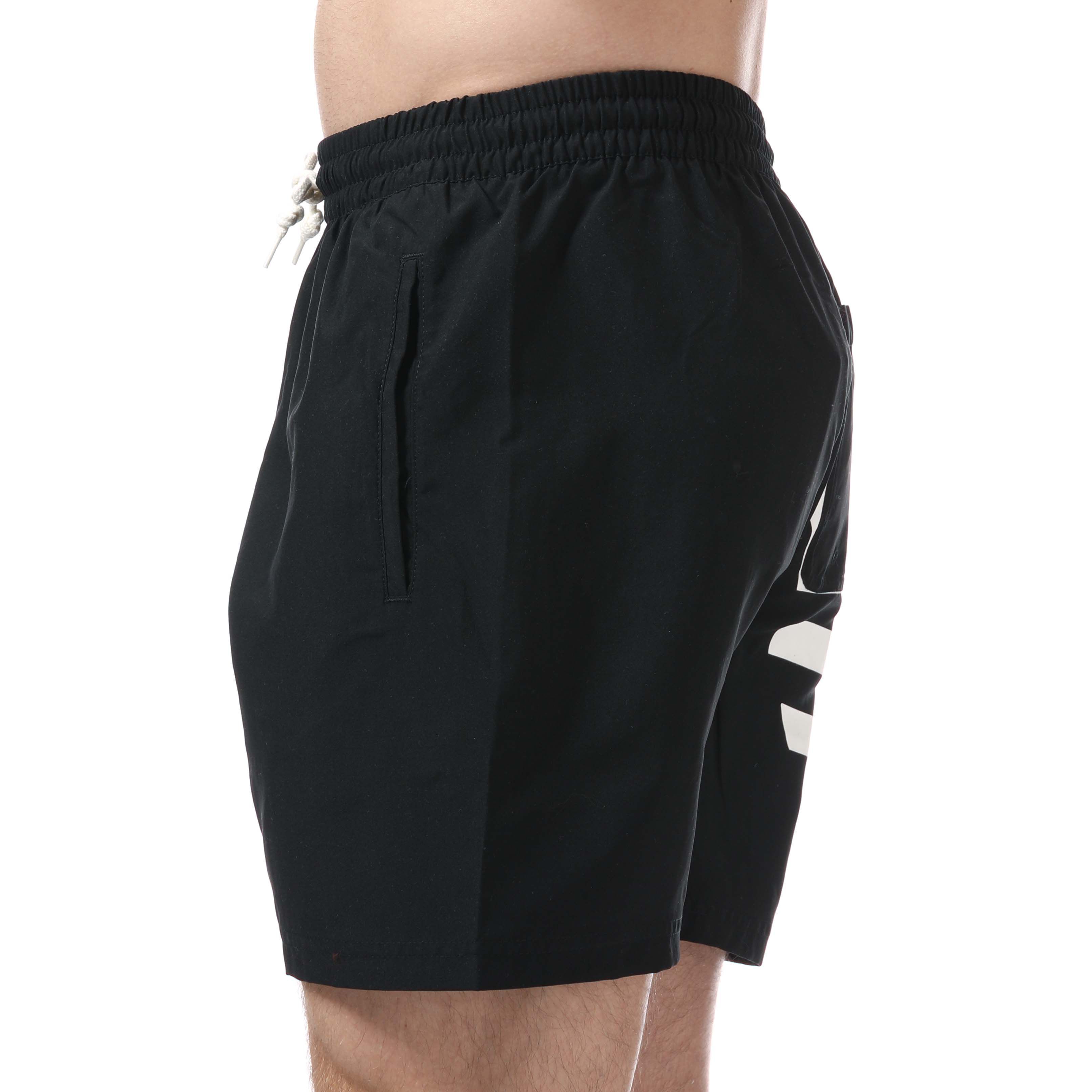 Mens adidas Originals Big Trefoil Swim Shorts in black.- Elasticated waist with drawstring adjustment.- Dual side pockets with secure zipper closure and wallet pocket to back.- Contrast adidas Originals Trefoil branding to side and back pocket.- Mesh inner briefs.- Regular fit.- Main material: 100% Polyester.- Ref: FM9911