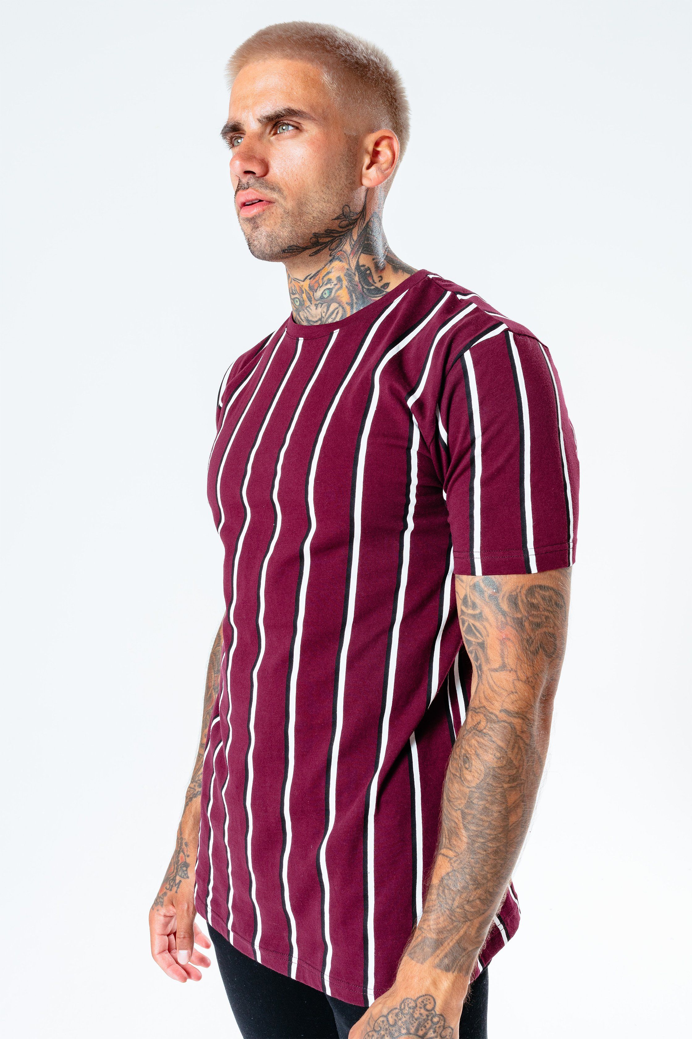 The HYPE. burgundy stripe men's t-shirt pairs perfectly with the HYPE. men's black joggers for an off-duty relaxed look. Coming in with a burgundy, white and black colour palette in an 100% cotton fabric base for supreme comfort. Designed in our standard men's tee shape, with a crew neckline and short sleeves. Finished with an embroidered embossed patch on the sleeve. Machine wash at 30 degrees.
