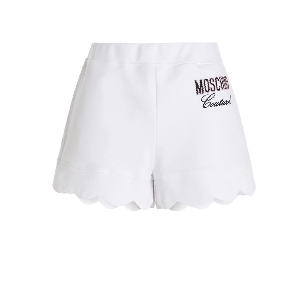 Gauze cotton shorts with scalloped hem and logo embroidery.