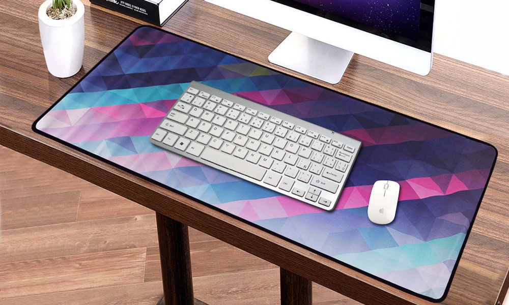 Kaleidoscope Pattern Anti-Slip Keyboard Mat Laptop Computer Extended Gaming Mouse Pad

Large size design gaming mouse pad which is more than 3 mm thick to help you get a better operating experience when playing games. On the desk, it can prevent the keyboard and mouse sliding, so that the mouse will be more smoothly to reduce the error operation. It is a good companion on the computer desk.

Key Features: 

    Material: Rubber and cloth. Thick, comfortable, firm, mouse pad using premium materials. It has a waterproof coating to prevent damage from drinks and it can simply wash in hand
    High Quality Anti-Fraying Stitched Frame: The edge of the mouse pad using precision locking process, ensures it doesn't fray or fall apart or no cracklike other mouse pads
    Smooth Surface: Smooth surface designed for optical mice, no skipping, ensures fast smooth movement while maintaining speed and control during gaming,it improves tracking mouse movements, great for big screens
    Anti-Slip Rubber Base: The bottom of the mouse pad features a non-skid backing so it stays firmly in place
    Size: 600mm x 300mm x 2mm/23.62