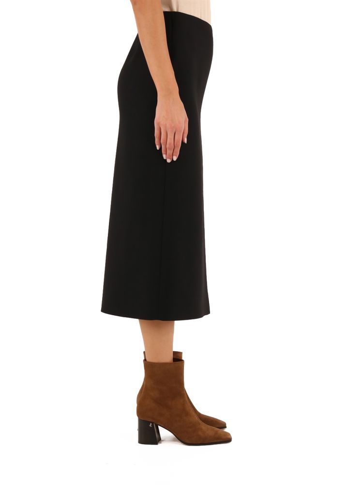 Pencil longuette skirt with letareal slit made of a blend of virgin wool and black silk. High-waisted model.The model is 1.78 cm tall and wears size 40IT / 34FR / S