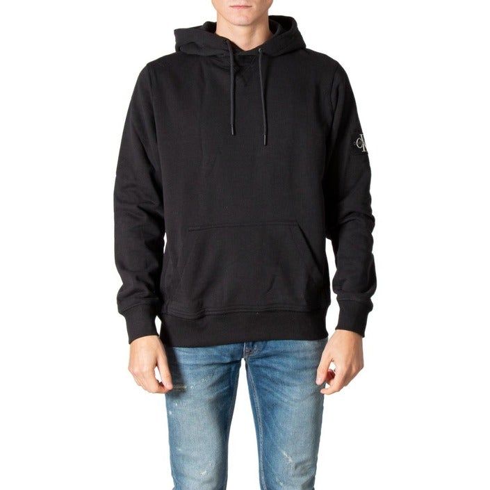 Brand: Calvin Klein Jeans Gender: Men Type: Sweatshirts Season: Fall/Winter  PRODUCT DETAIL • Color: black • Collar: hood  COMPOSITION AND MATERIAL • Composition: -100% cotton  •  Washing: machine wash at 30° -100% Cotton