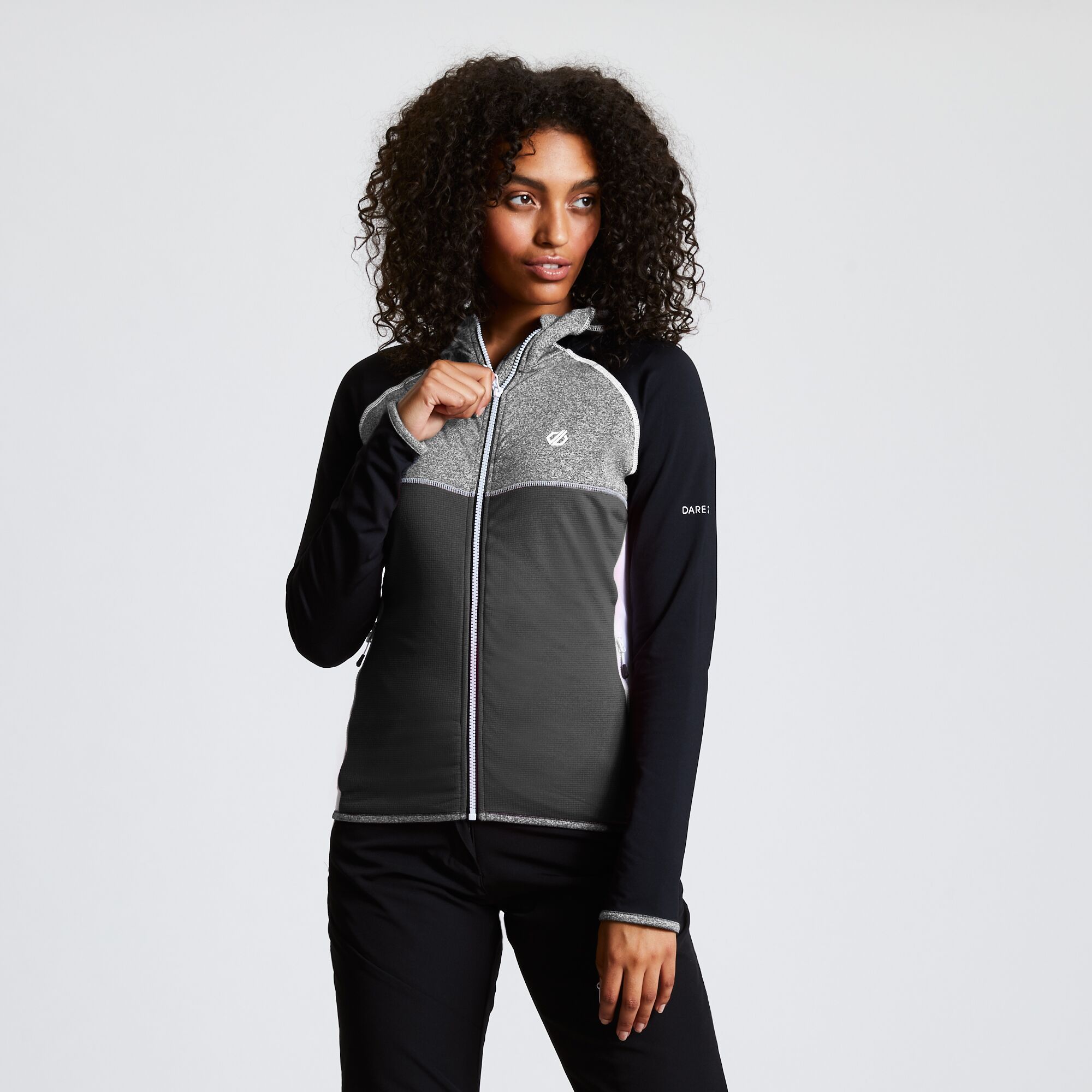 Material: 100% Polyester. Lightweight, stretch fabric hooded sweatshirt with full length zip. Stretch binding to hood opening, cuffs and hem. Inner zip and chin guard. 2 lower zip pockets.