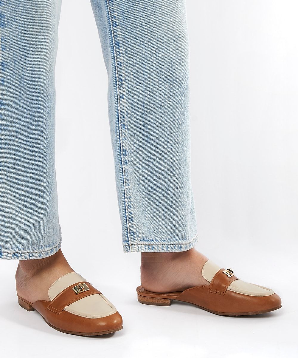 Upgrade your loafer line-up with this luxe leather style. The backless silhouette is comfortable and on-trend.