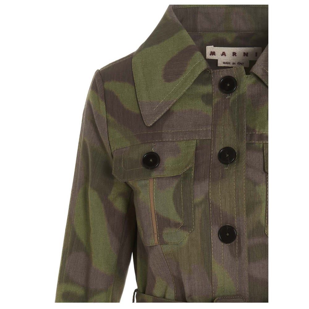 Cotton camouflage bush jacket with an all over print, a waist belt and multi pockets.