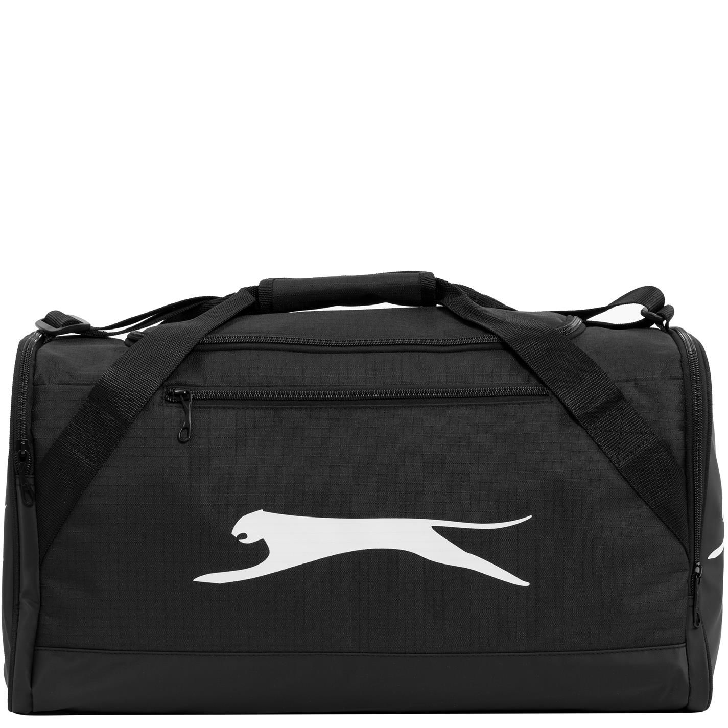 Slazenger Small Holdall - This Slazenger Small Holdall is ideal for everyday use, carrying your items to the gym or taking on a weekend away. It has a main zipped compartment to the top, a handy zip pocket on the front plus two further zip pockets to the sides for additional storage. There is an adjustable padded shoulder strap for carrying, which can be removed, a soft grip handle and smaller carry handles to the sides. The bag is finished off with Slazenger branding. This product may have slight cosmetic differences from the image shown due to assorted colours or updated seasonal collections. > Holdall > Main zipped compartment > 3 zip pockets > Removable, adjustable, padded shoulder strap > Soft carry handle > 2 side carry handles > Slazenger branding > L46cm x W22cm x D26cm > Wipe clean with a damp cloth
