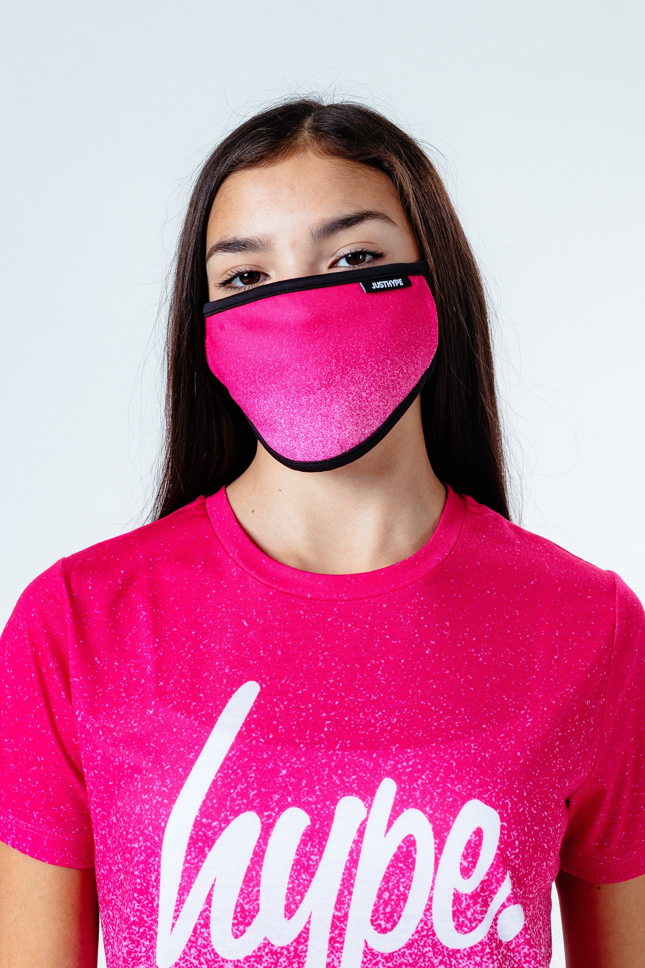 If you love pink, this is the combo you need to add to your everyday 'drobe. The HYPE. kids pink speckle t-shirt and face mask set, perfect for those who love to co-ordinate. Designed in our iconic speckle fade print in a pink and white colour palette. The T-shirt features our unisex standard t-shirt shape, with a crew neckline and short sleeves, finished with the supreme amount of comfort. The face masks is in a kids size, with an ear loop design in the perfect amount of comfort and breathing space you require. Machine wash at 30 degrees.