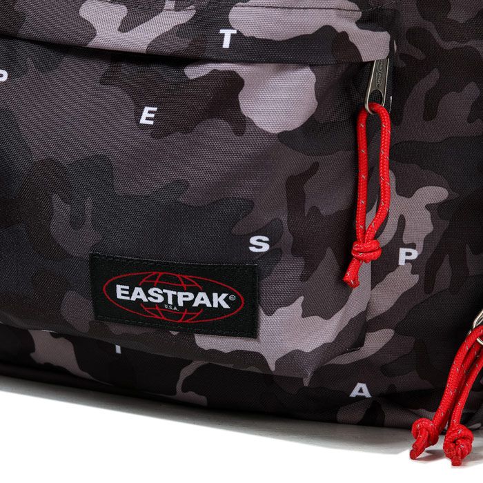 Eastpak Out Of Office Backpack in red.- Main compartment with front and internal pockets.- Padded back panel and adjustable shoulder straps.- Padded laptop sleeve for most 13-inch devices.- Contrasting lining and trims.- Main material: 100% Polyester.  - Ref: EK000767I911- Measurements are intended for guidance only.